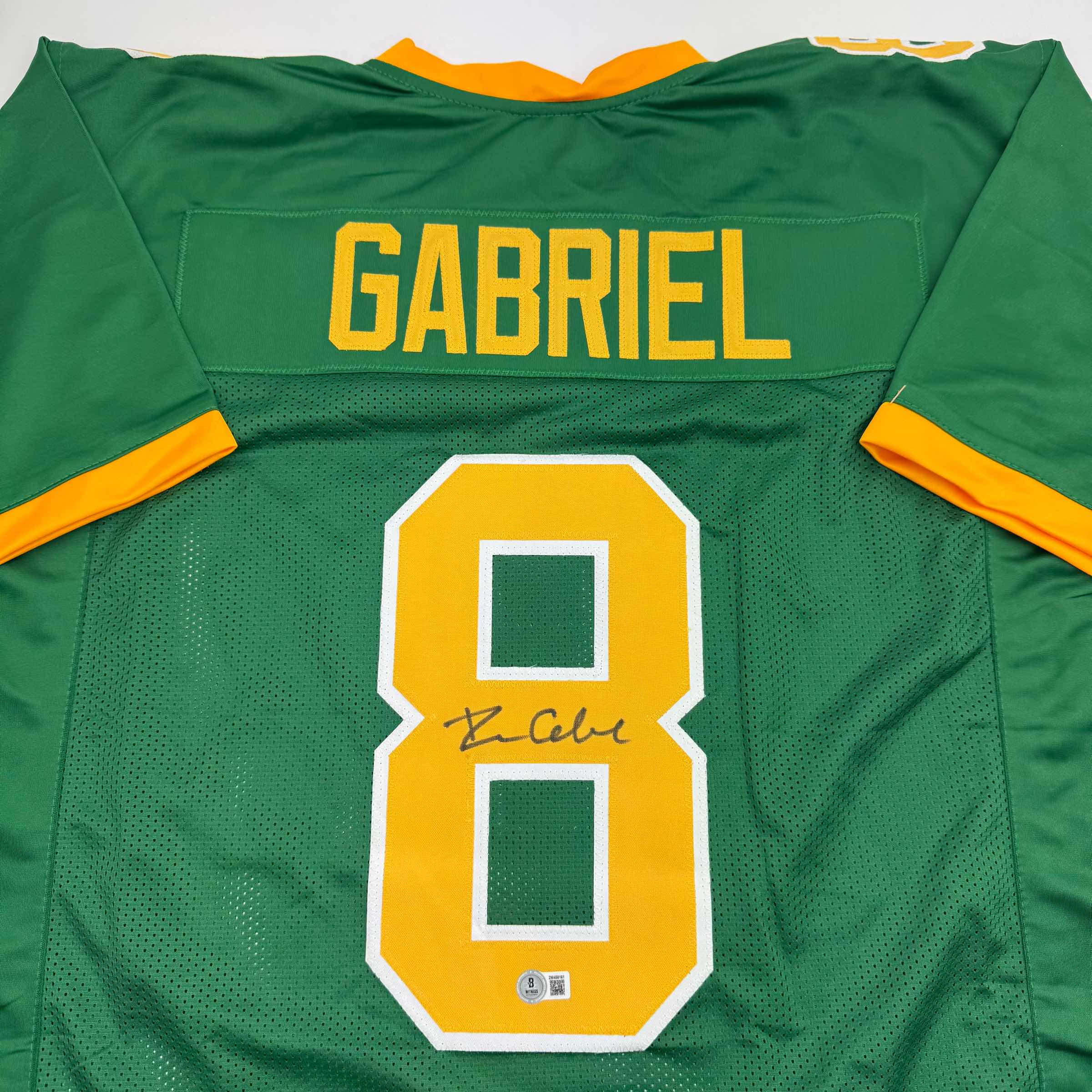 autographed-signed-dillon-gabriel-oregon-green-college-football-jersey-beckett-bas-coa