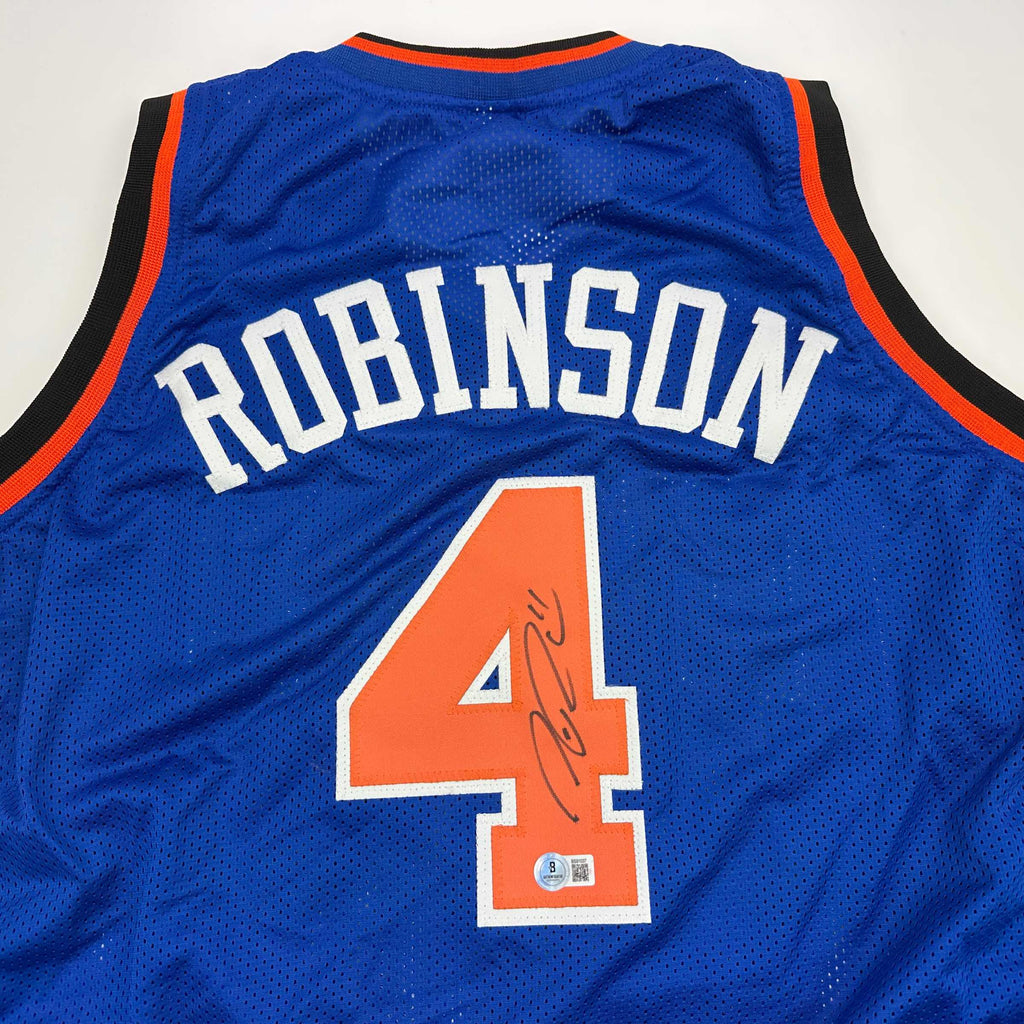 autographed-signed-nate-robinson-new-york-blue-basketball-jersey-beckett-bas-coa