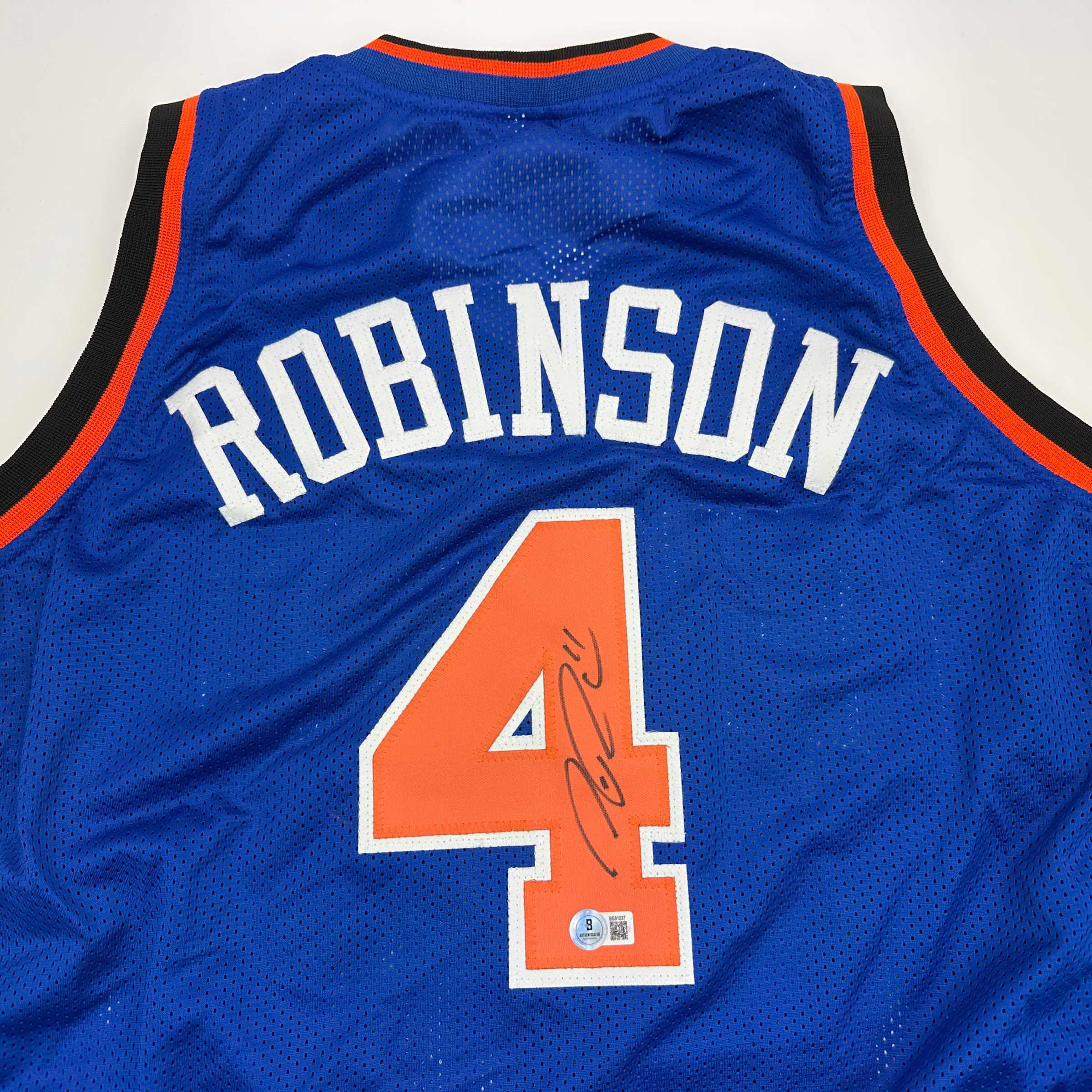autographed-signed-nate-robinson-new-york-blue-basketball-jersey-beckett-bas-coa
