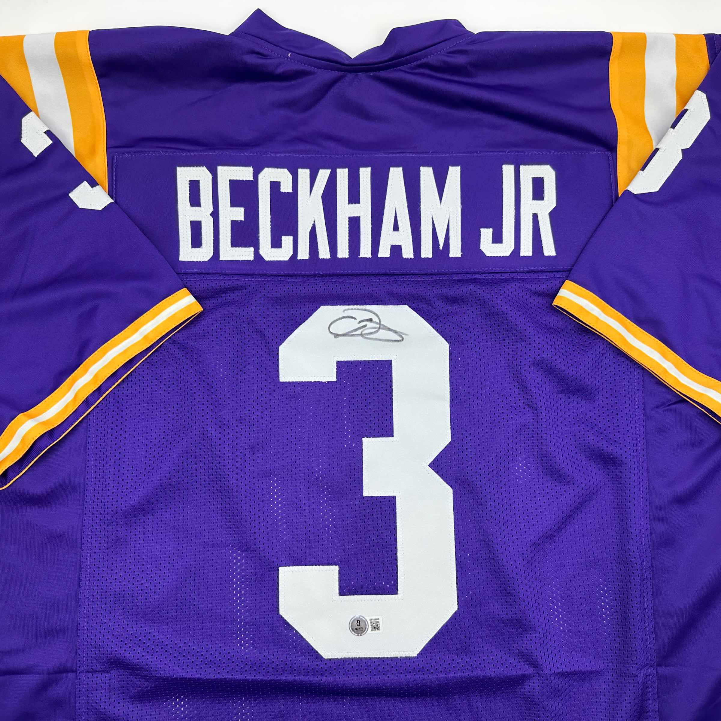 autographed-signed-odell-beckham-jr-lsu-purple-college-football-jersey-beckett-bas-coa