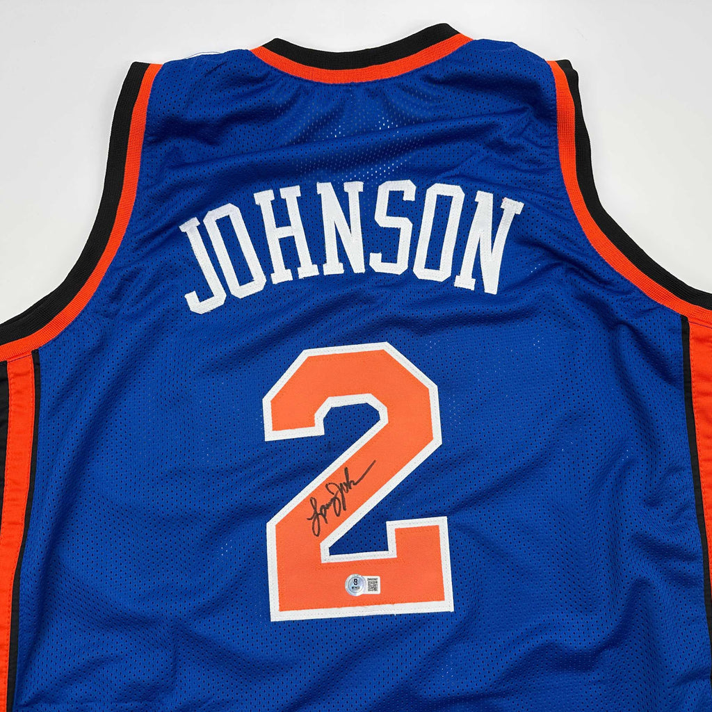 autographed-signed-larry-johnson-new-york-blue-basketball-jersey-beckett-bas-coa