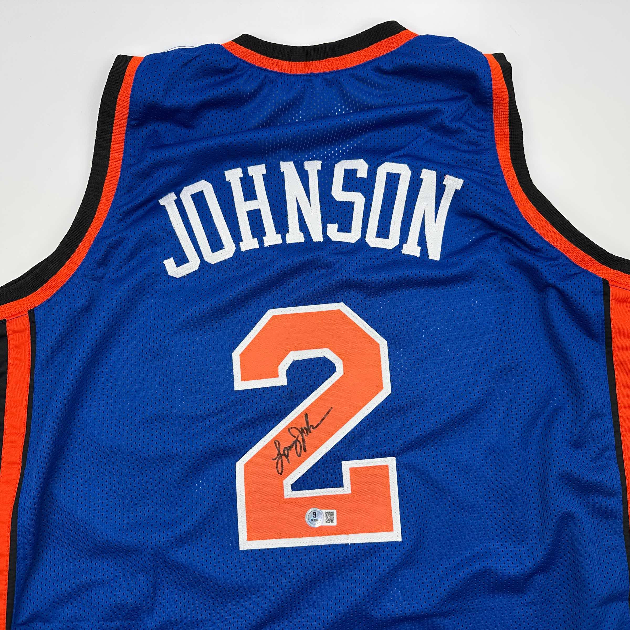 autographed-signed-larry-johnson-new-york-blue-basketball-jersey-beckett-bas-coa