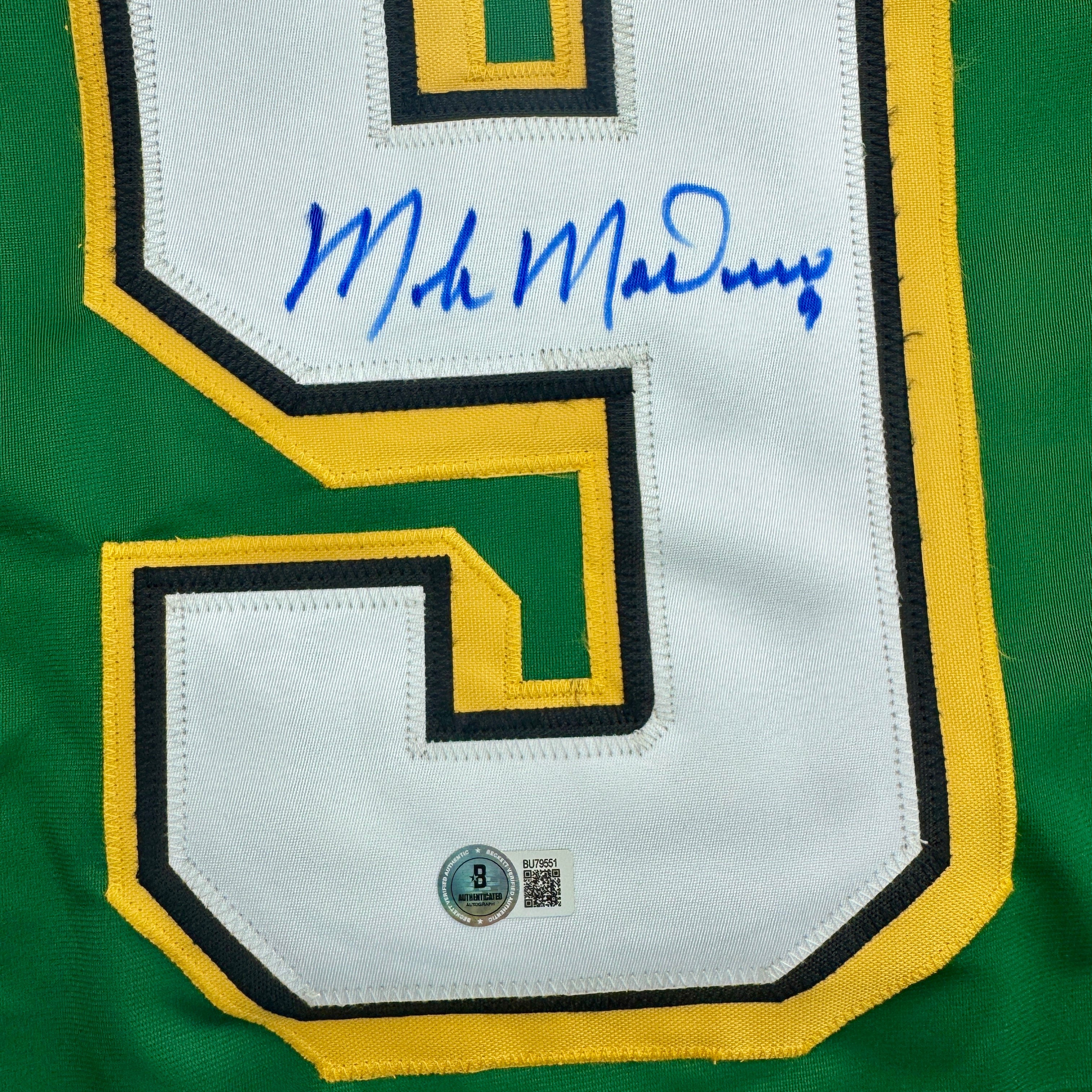 autographed-signed-mike-modano-minnesota-green-hockey-jersey-beckett-bas-coa