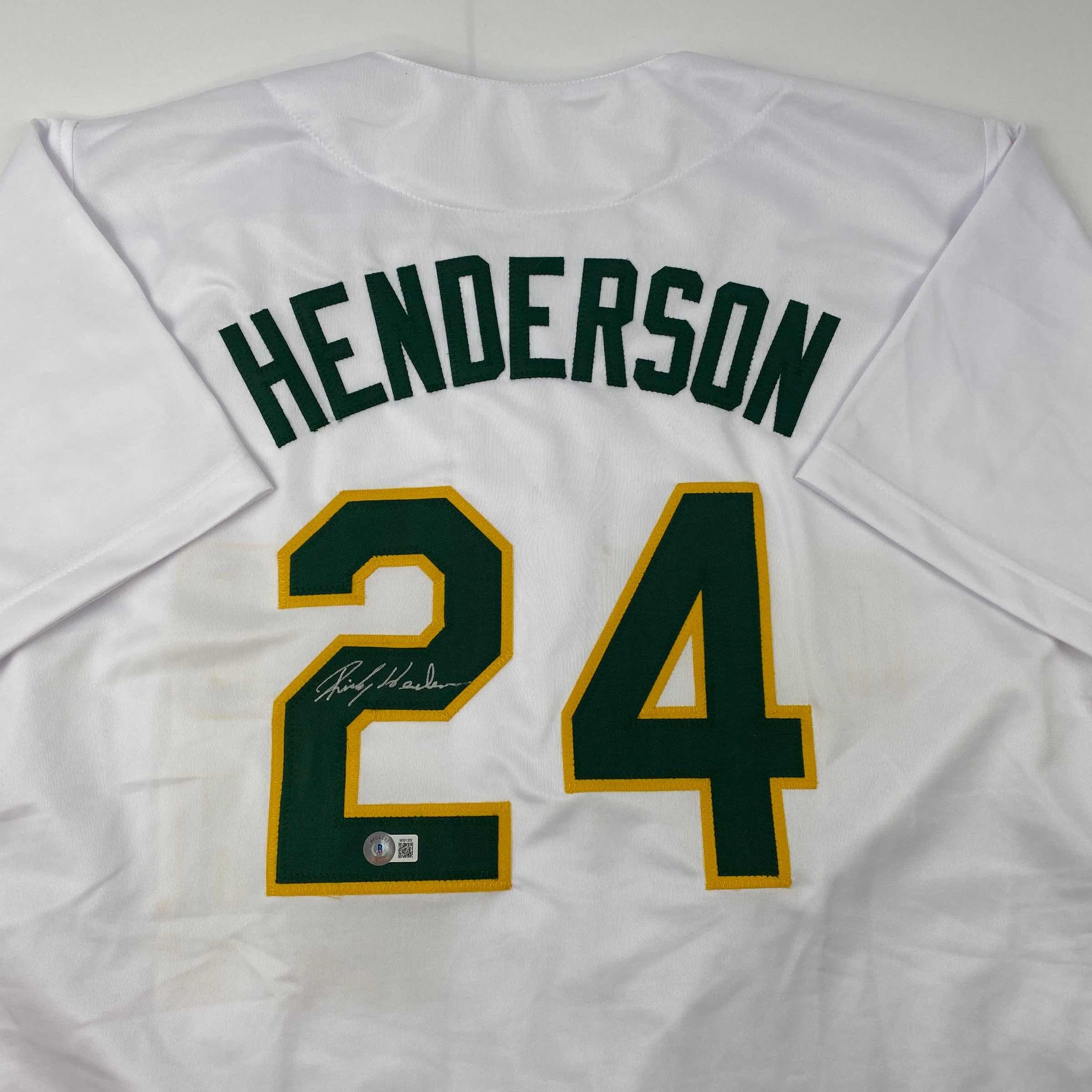 autographed-signed-rickey-henderson-oakland-white-baseball-jersey-beckett-bas-coa