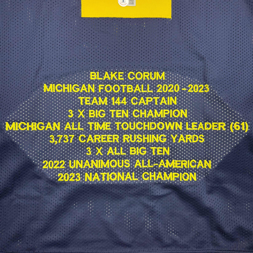 autographed-signed-blake-corum-michigan-blue-stat-college-football-jersey-beckett-bas-coa