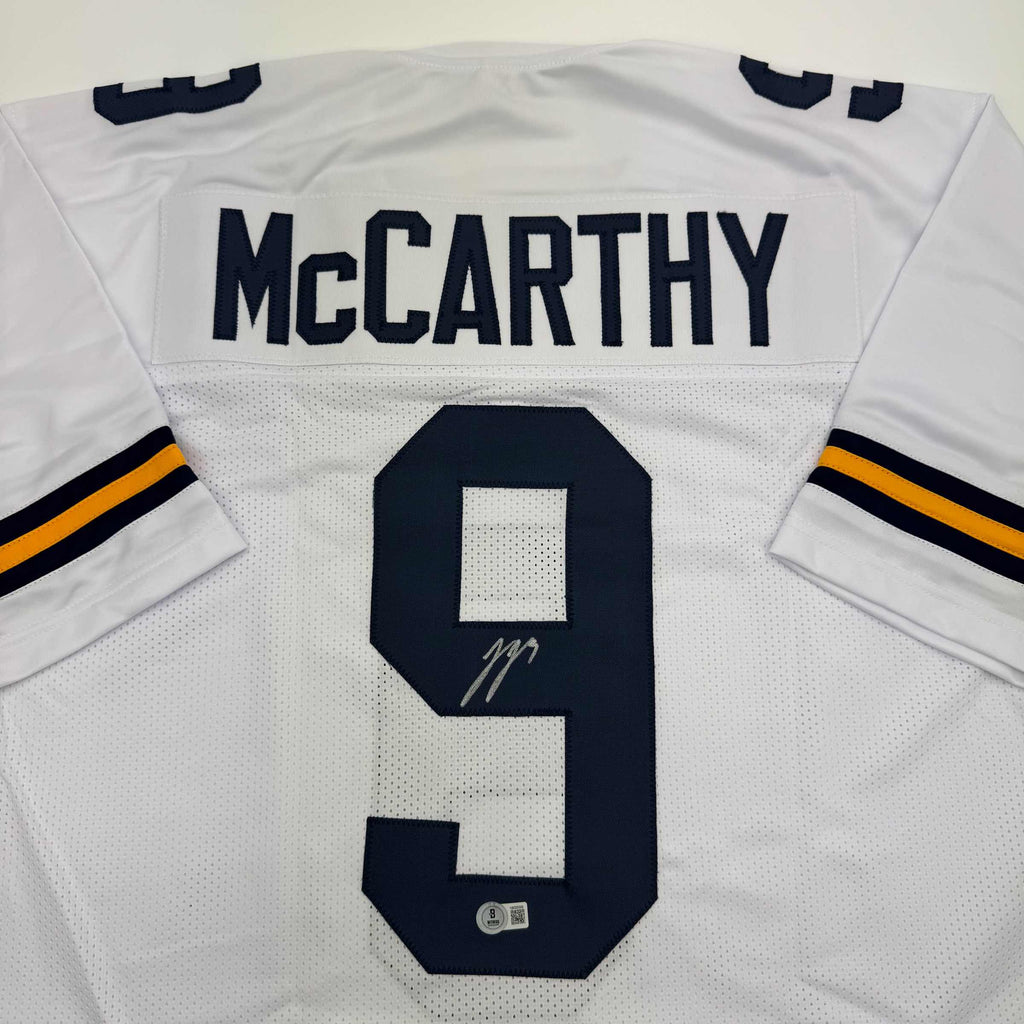 autographed-signed-j-j-jj-mccarthy-michigan-white-college-football-jersey-beckett-bas-coa