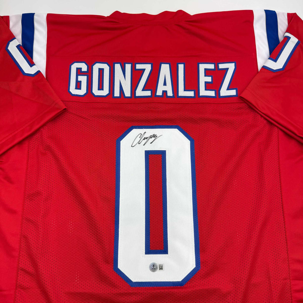autographed-signed-christian-gonzalez-new-england-red-football-jersey-beckett-bas-coa