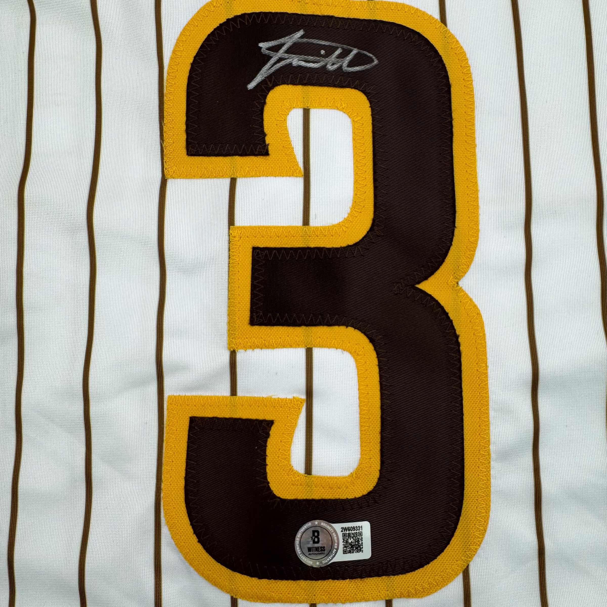 autographed-signed-jackson-merrill-san-diego-pinstripe-baseball-jersey-beckett-bas-coa
