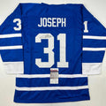 autographed-signed-curtis-joseph-toronto-blue-hockey-jersey-jsa-coa