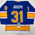 autographed-signed-curtis-joseph-st-louis-blue-hockey-jersey-jsa-coa