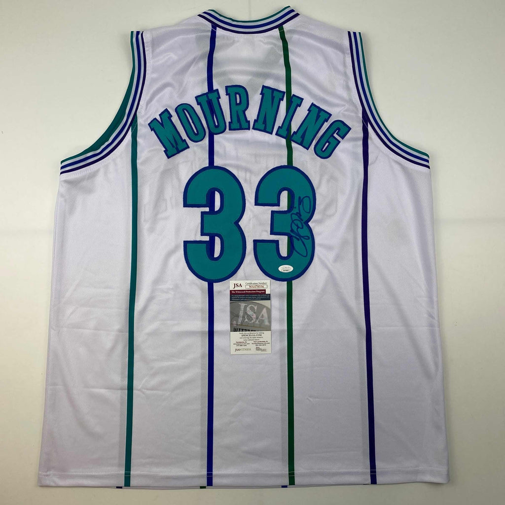 autographed-signed-alonzo-mourning-charlotte-white-basketball-jersey-jsa-coa