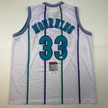 autographed-signed-alonzo-mourning-charlotte-white-basketball-jersey-jsa-coa