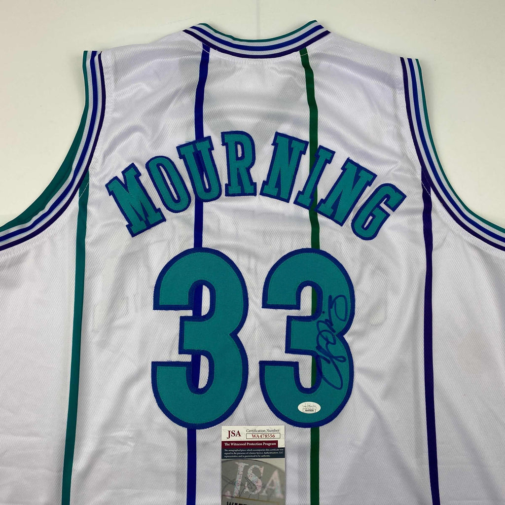 autographed-signed-alonzo-mourning-charlotte-white-basketball-jersey-jsa-coa