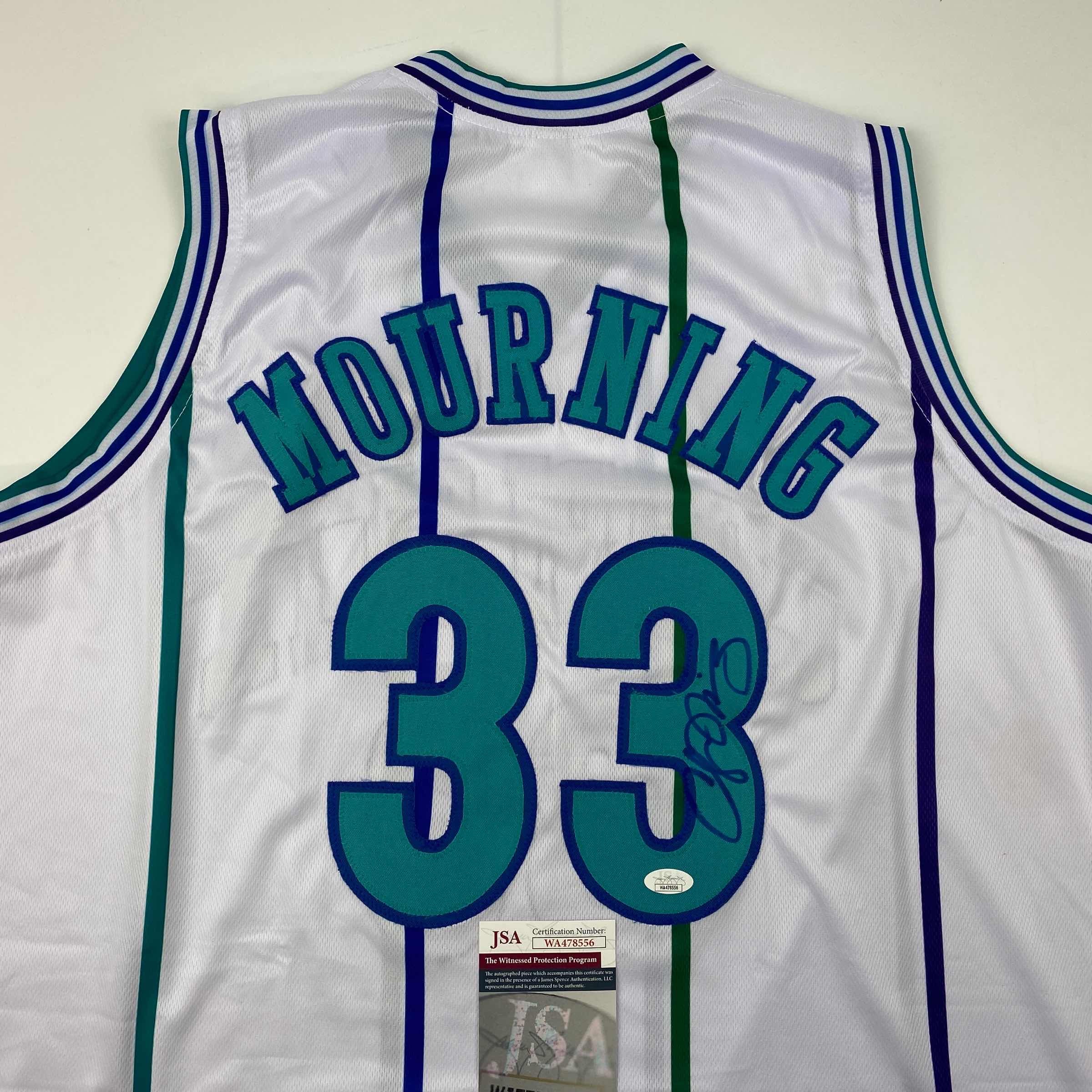 autographed-signed-alonzo-mourning-charlotte-white-basketball-jersey-jsa-coa