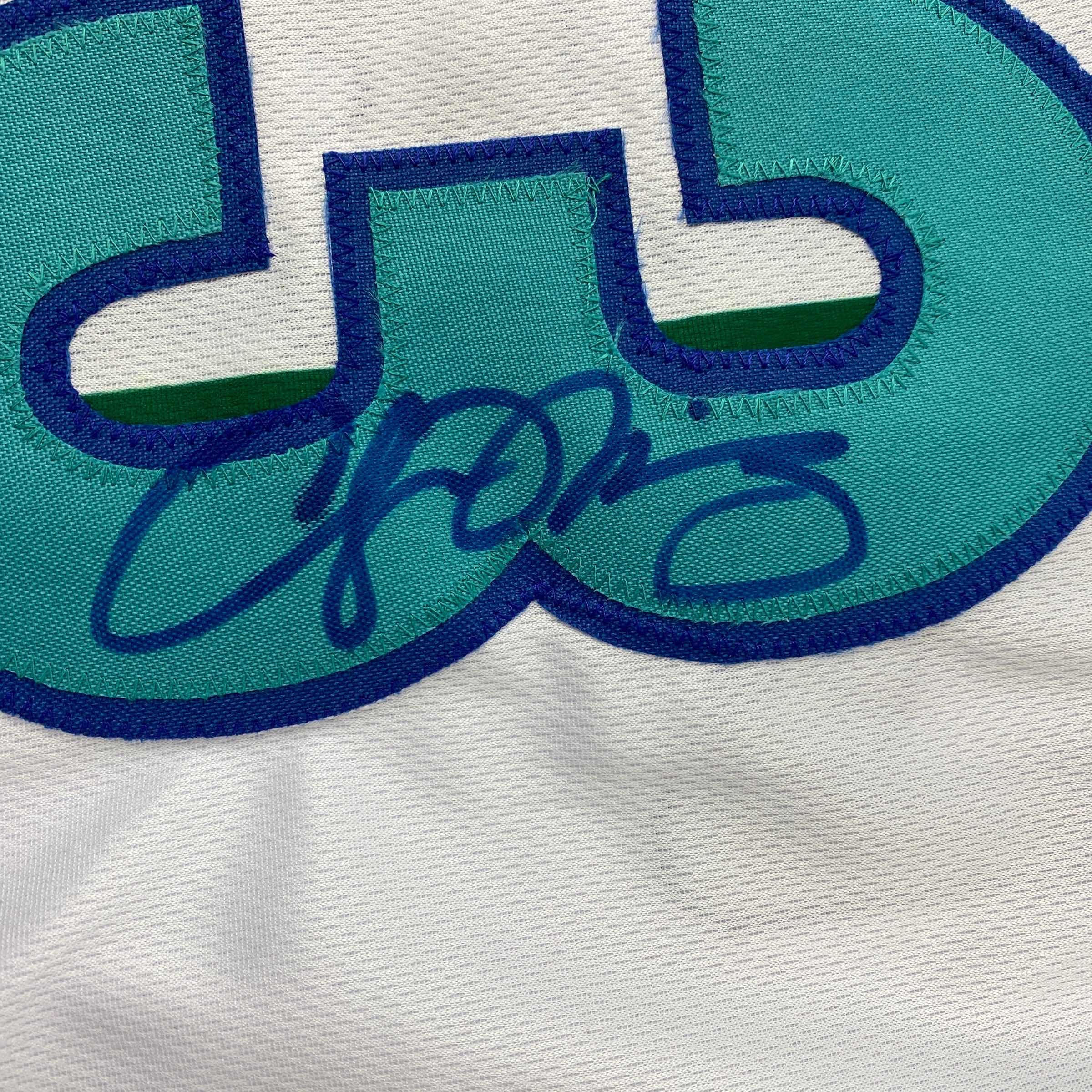autographed-signed-alonzo-mourning-charlotte-white-basketball-jersey-jsa-coa