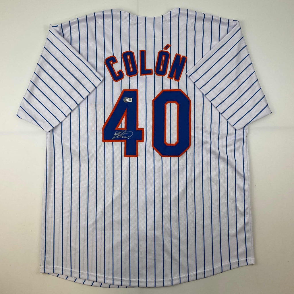 autographed-signed-bartolo-colon-new-york-pinstripe-baseball-jersey-beckett-bas-coa