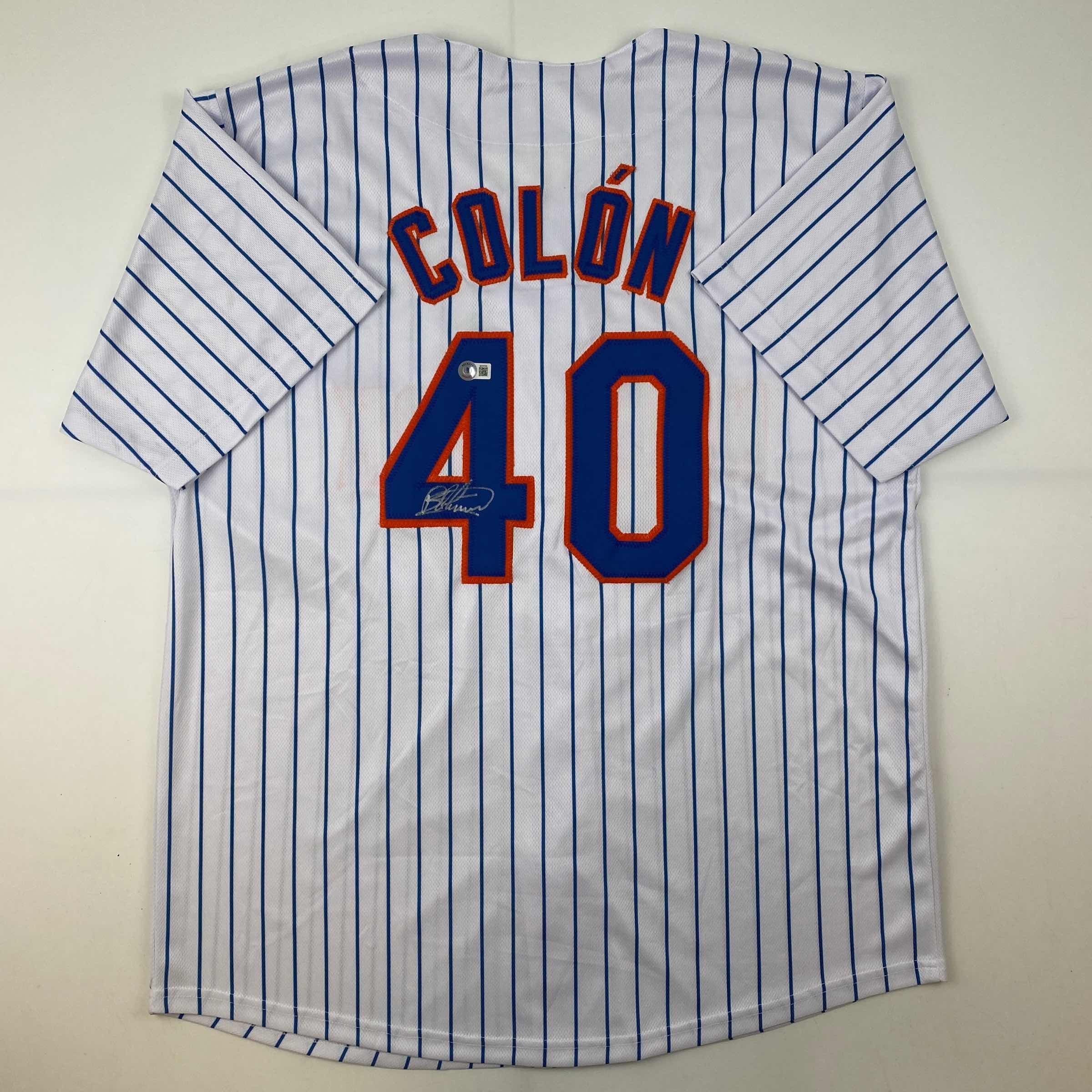 autographed-signed-bartolo-colon-new-york-pinstripe-baseball-jersey-beckett-bas-coa