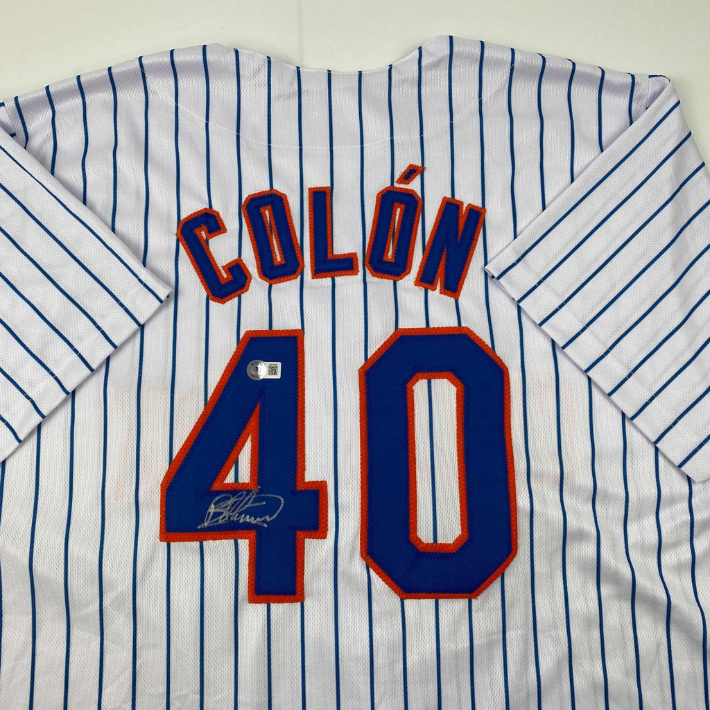 autographed-signed-bartolo-colon-new-york-pinstripe-baseball-jersey-beckett-bas-coa