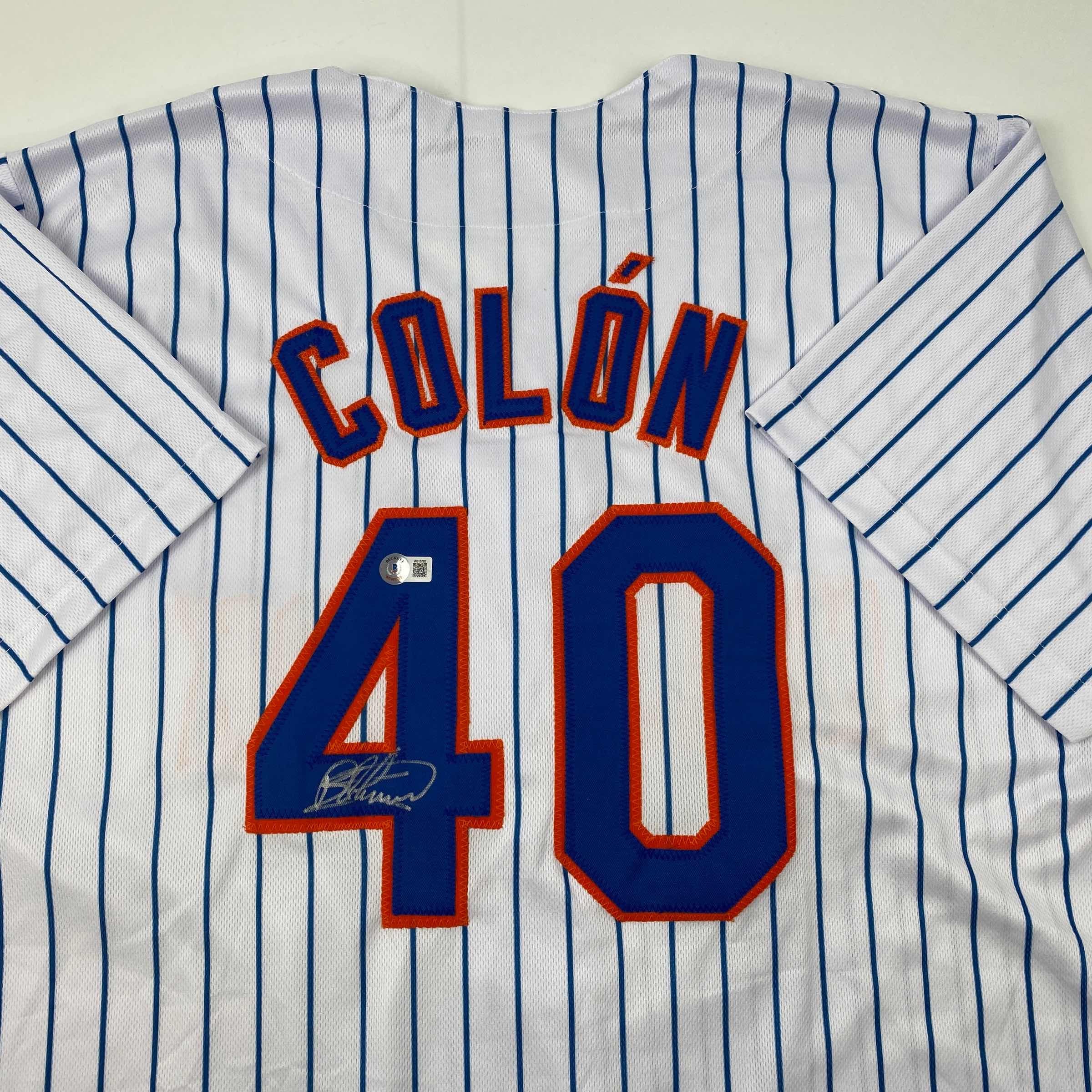 autographed-signed-bartolo-colon-new-york-pinstripe-baseball-jersey-beckett-bas-coa