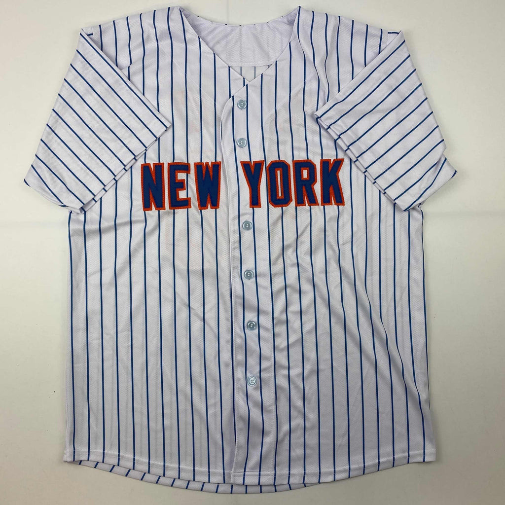 autographed-signed-bartolo-colon-new-york-pinstripe-baseball-jersey-beckett-bas-coa
