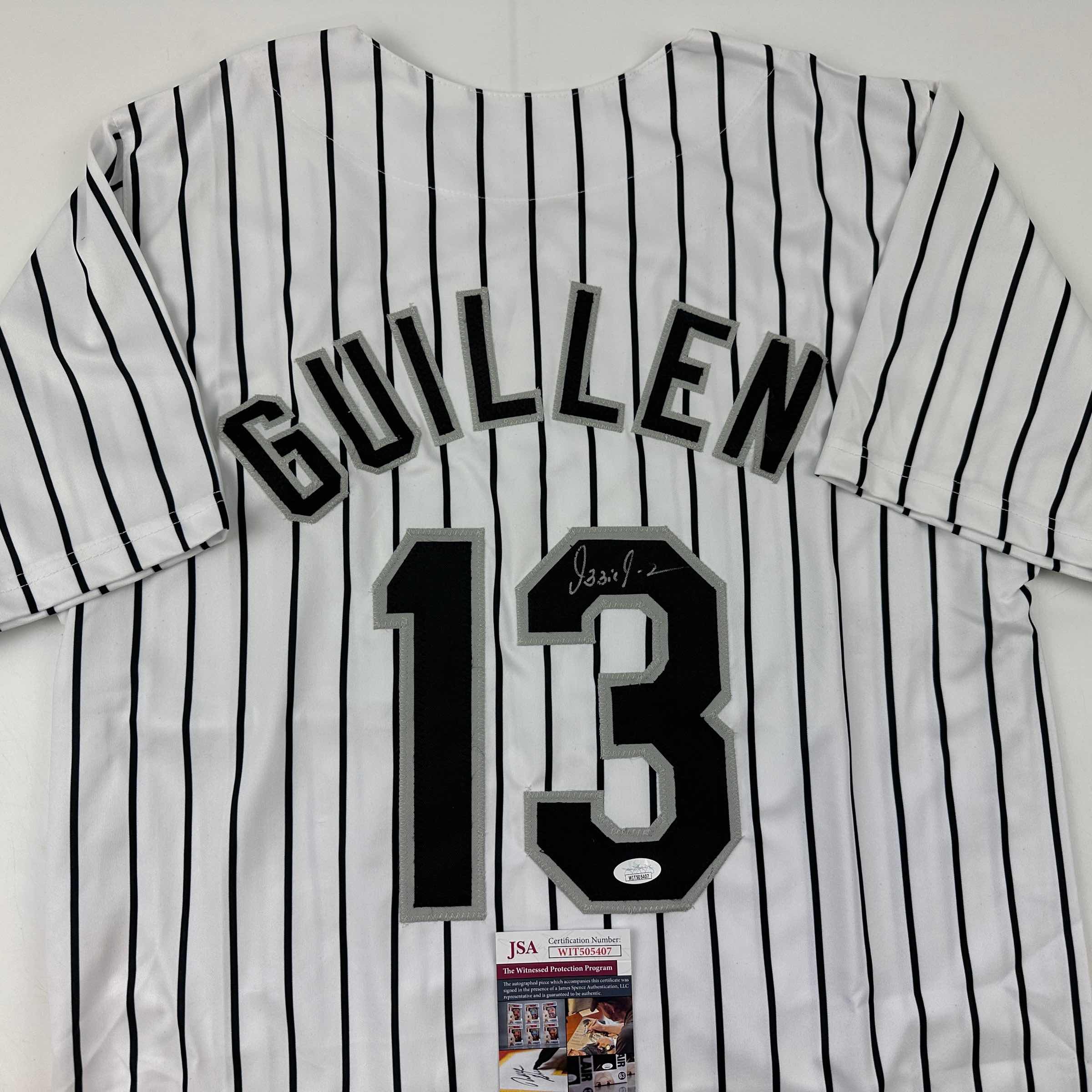 autographed-signed-ozzie-guillen-chicago-pinstripe-baseball-jersey-jsa-coa