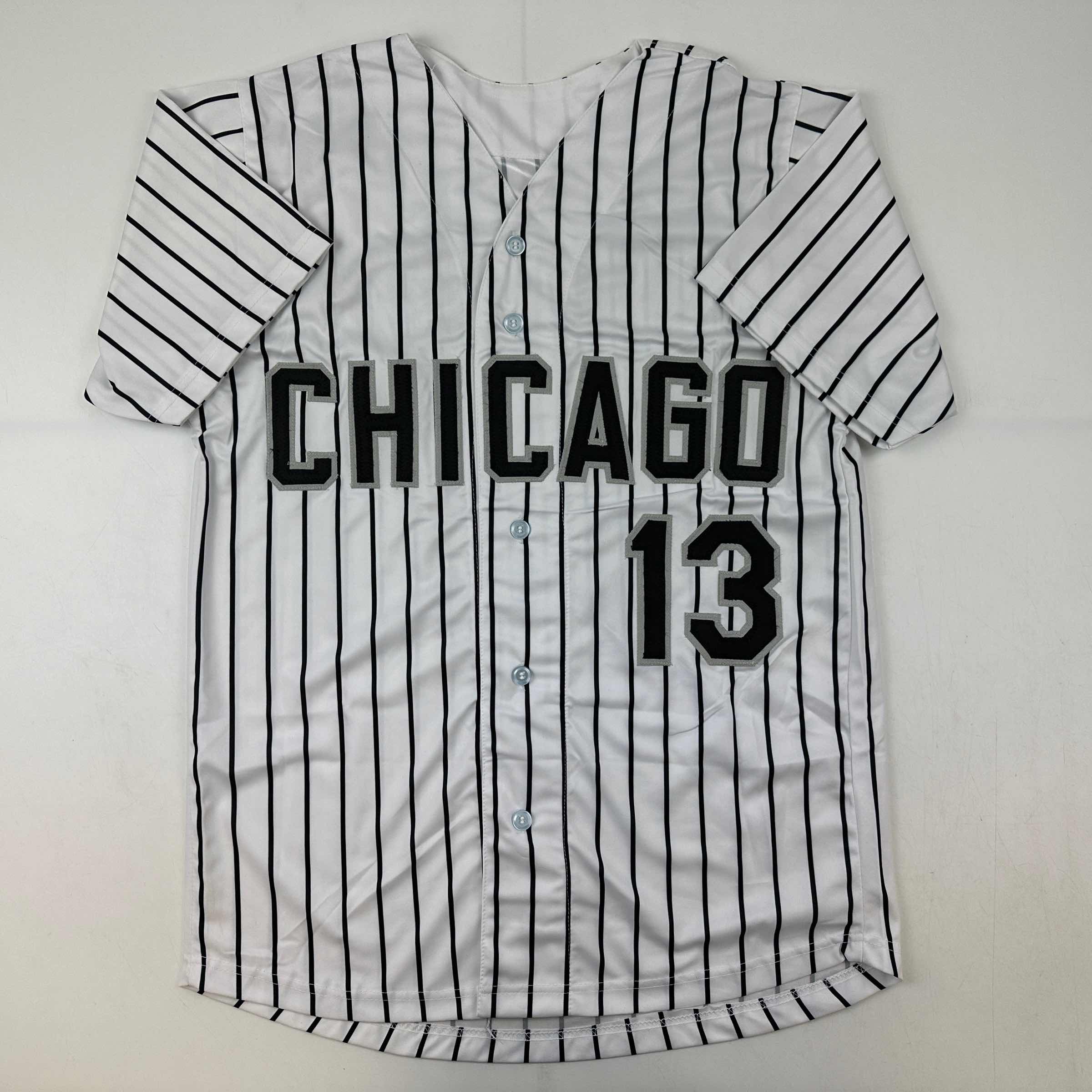 autographed-signed-ozzie-guillen-chicago-pinstripe-baseball-jersey-jsa-coa
