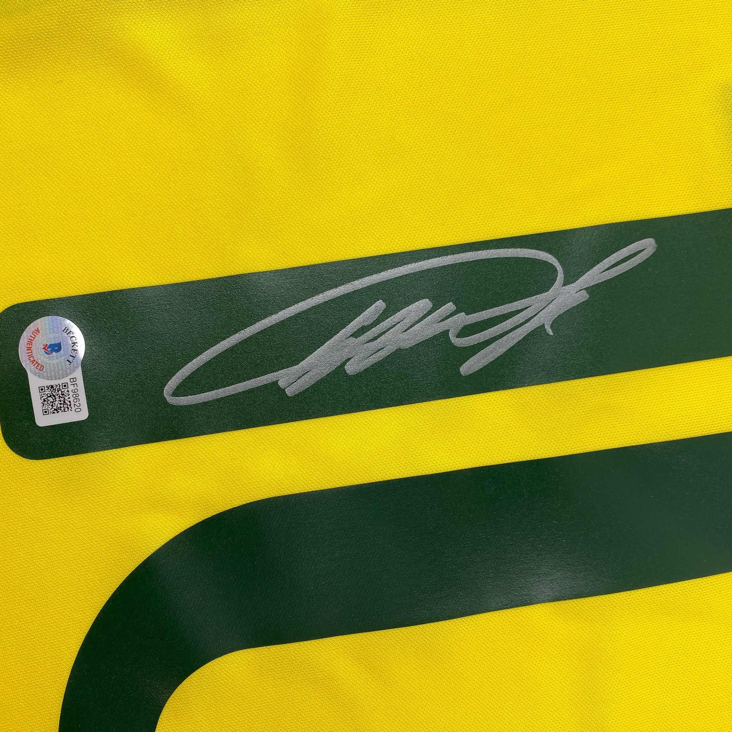 autographed-signed-ricardo-kaka-brazil-yellow-soccer-futbol-jersey-beckett-bas-coa
