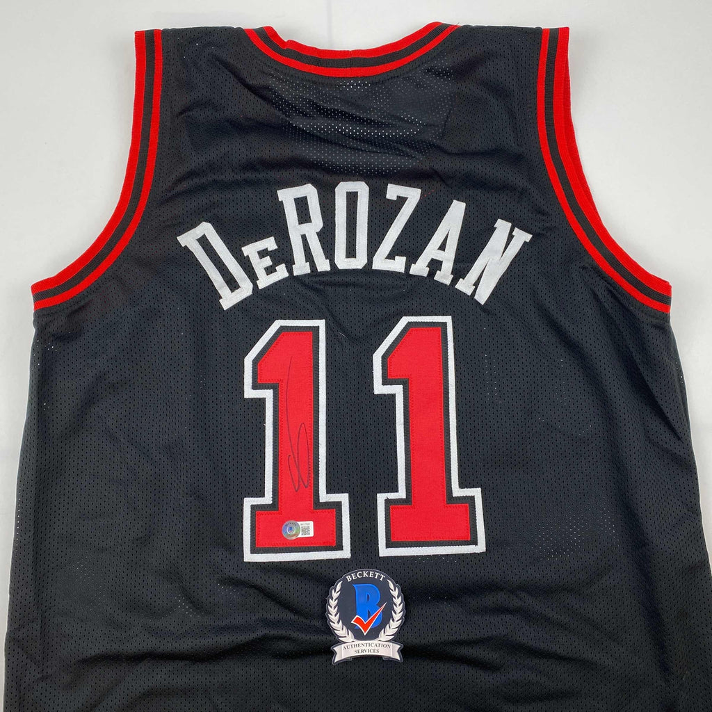 autographed-signed-demar-derozan-chicago-black-basketball-jersey-beckett-bas-coa