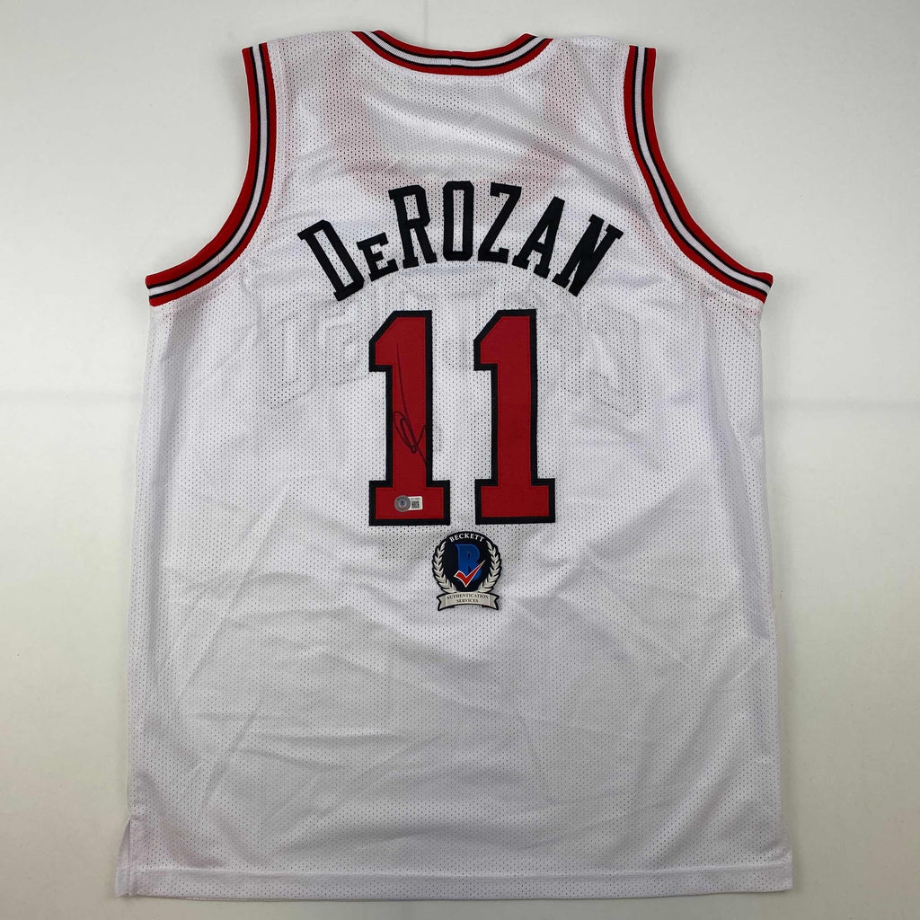 autographed-signed-demar-derozan-chicago-white-basketball-jersey-beckett-bas-coa