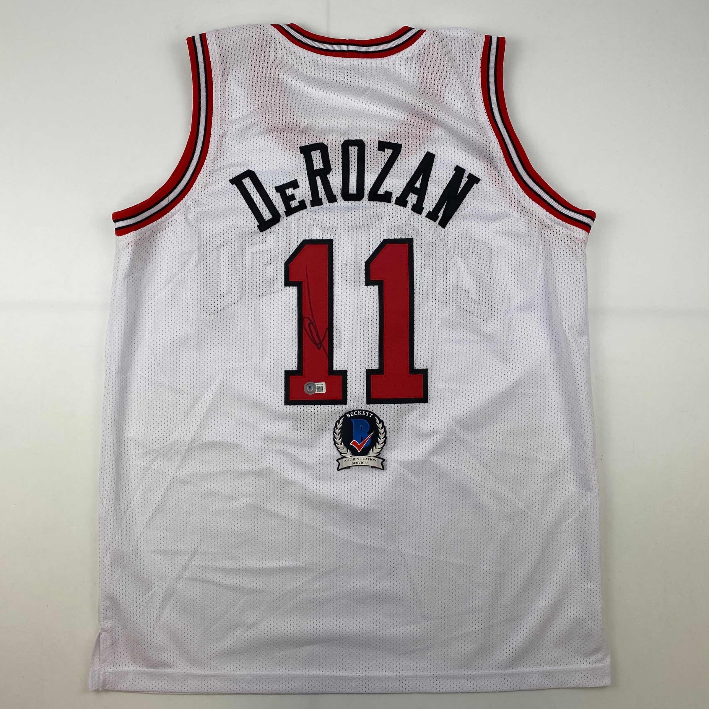 autographed-signed-demar-derozan-chicago-white-basketball-jersey-beckett-bas-coa