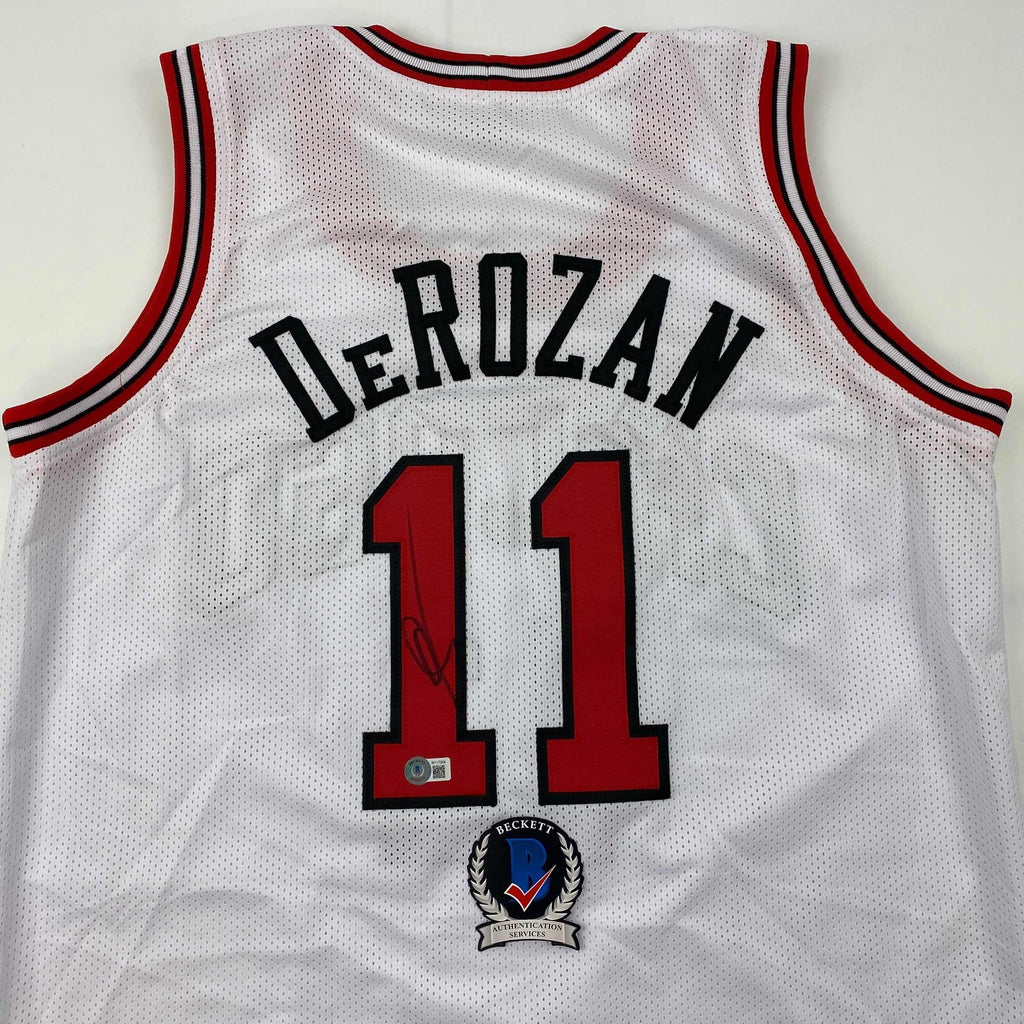 autographed-signed-demar-derozan-chicago-white-basketball-jersey-beckett-bas-coa