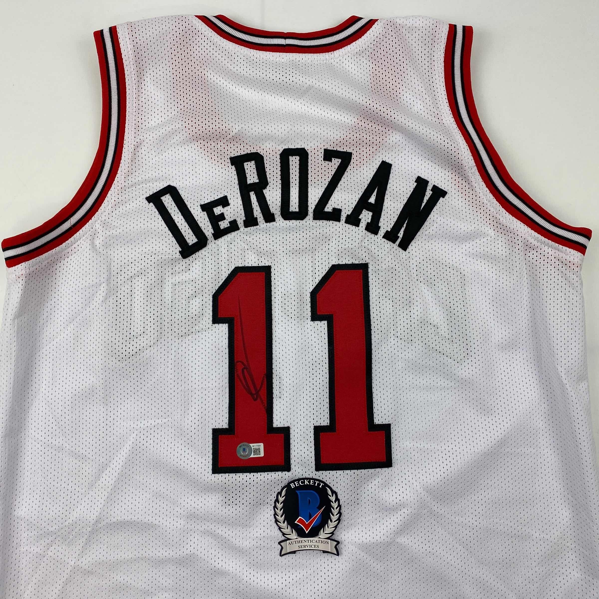 autographed-signed-demar-derozan-chicago-white-basketball-jersey-beckett-bas-coa