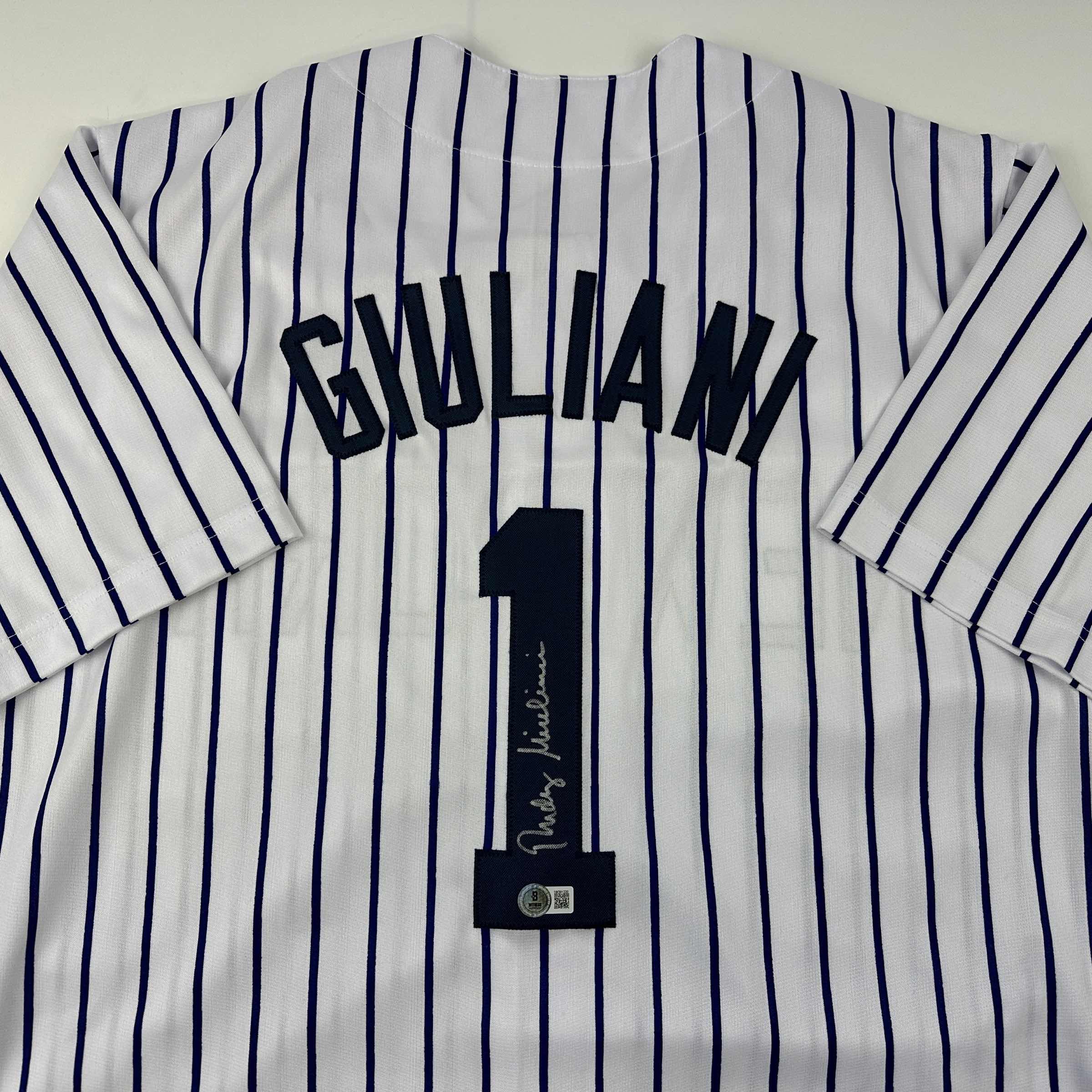 autographed-signed-rudy-giuliani-new-york-pinstripe-baseball-jersey-beckett-bas-coa