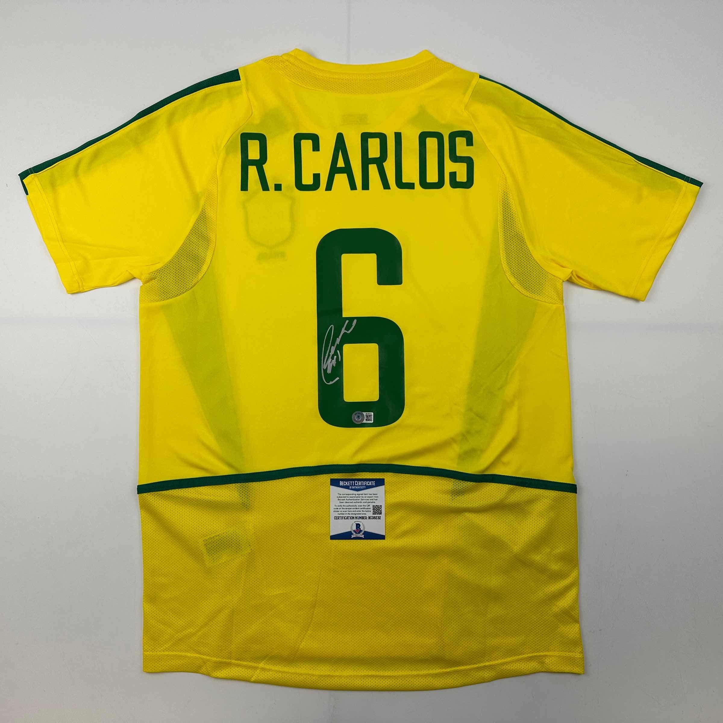 autographed-signed-roberto-carlos-brazil-yellow-soccer-jersey-beckett-bas-coa
