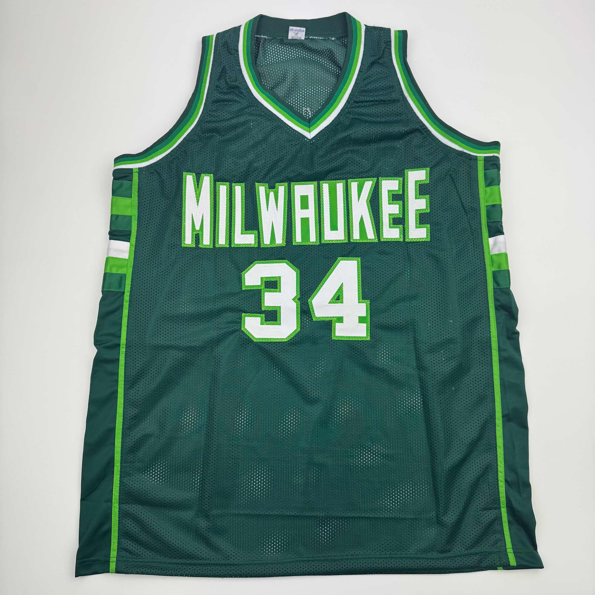 autographed-signed-terry-cummings-milwaukee-green-basketball-jersey-beckett-bas-coa