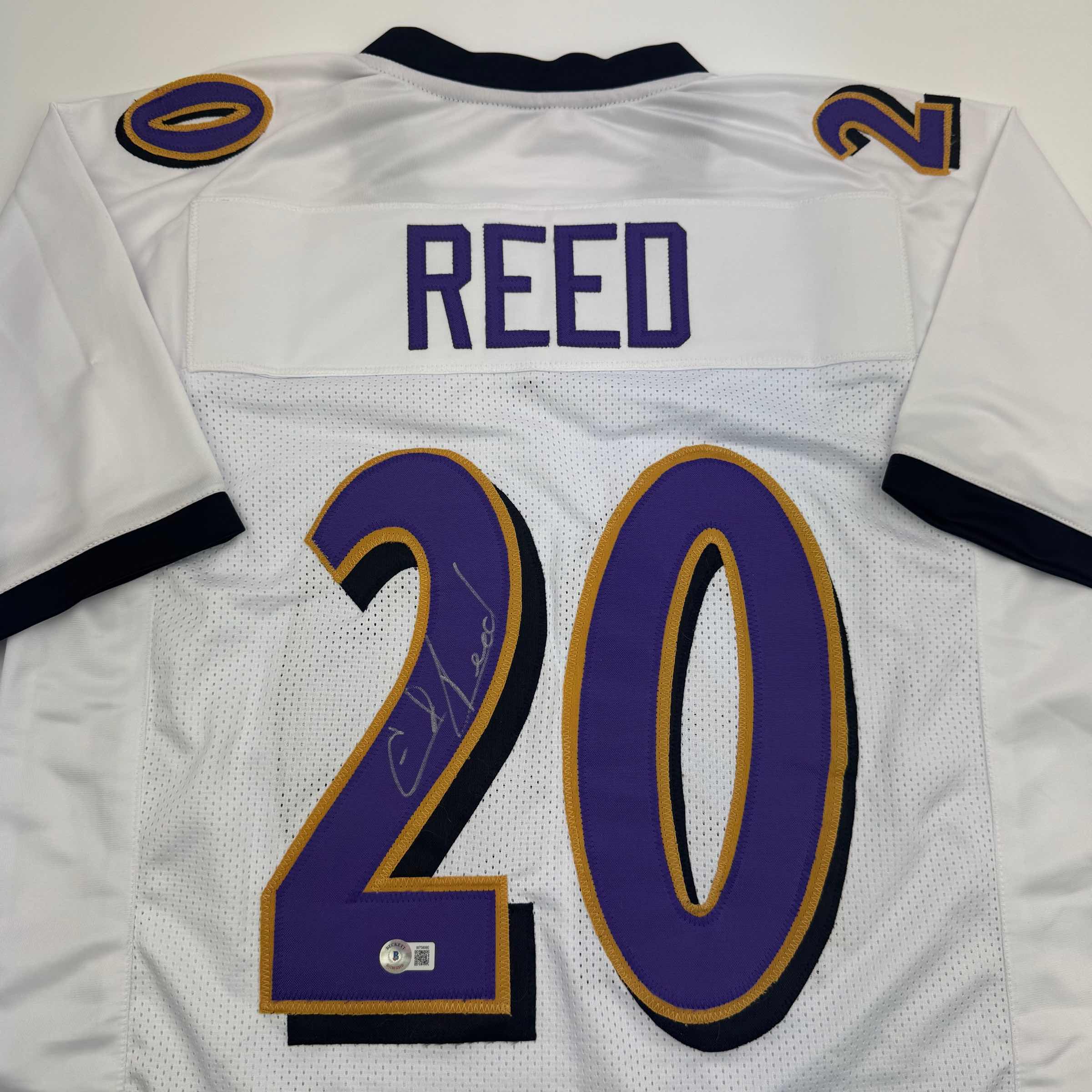 autographed-signed-ed-reed-baltimore-white-football-jersey-beckett-bas-coa