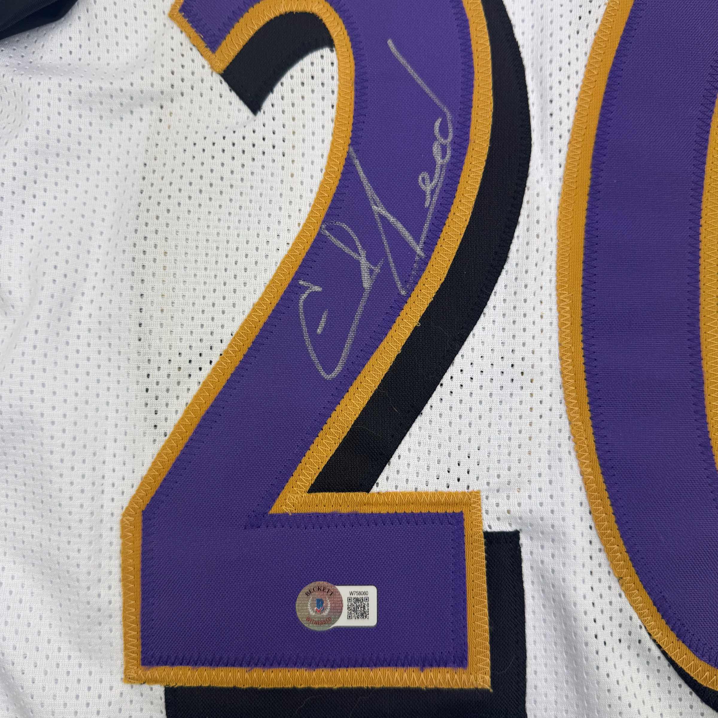 autographed-signed-ed-reed-baltimore-white-football-jersey-beckett-bas-coa