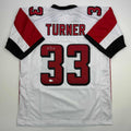 autographed-signed-michael-turner-atlanta-white-football-jersey-beckett-bas-coa