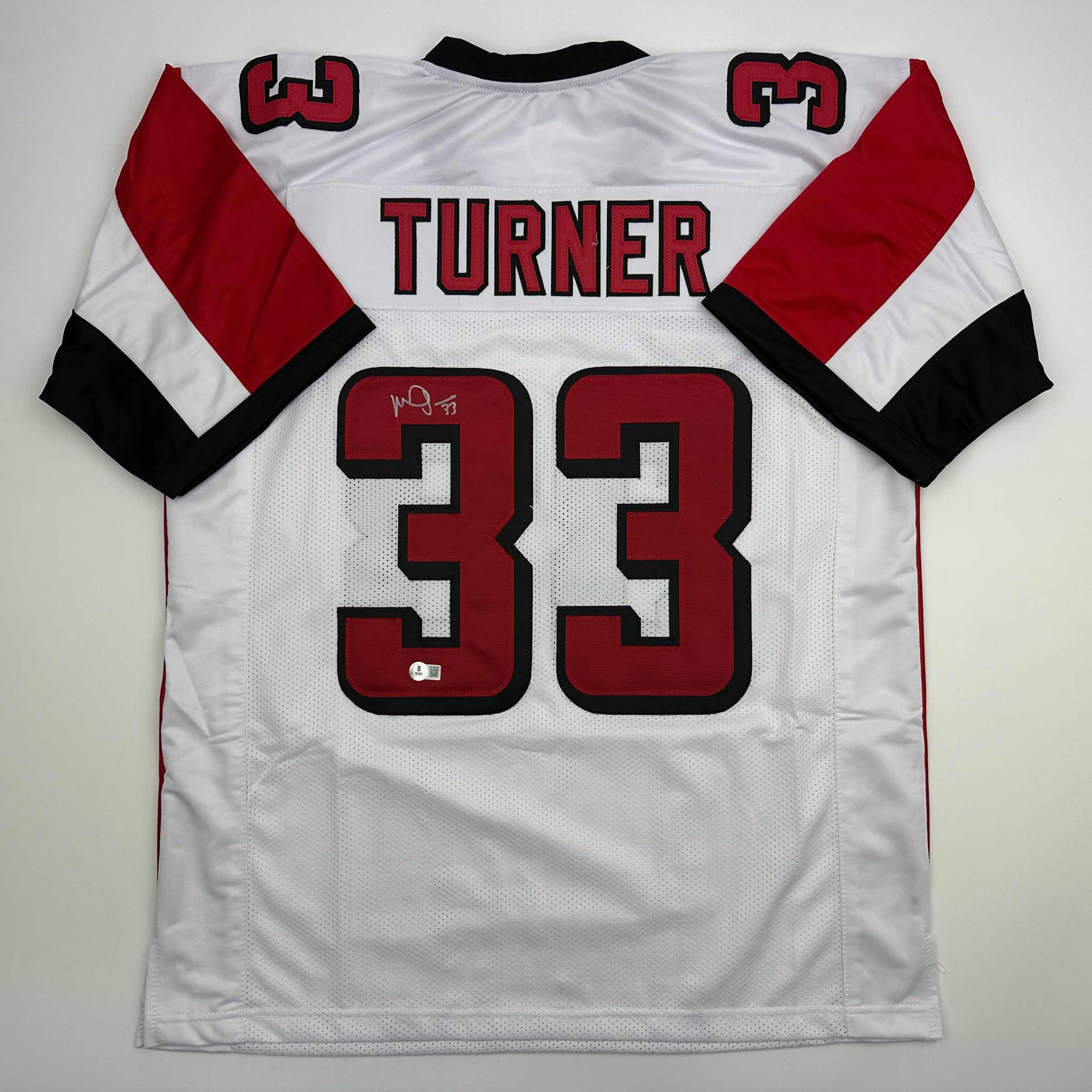 autographed-signed-michael-turner-atlanta-white-football-jersey-beckett-bas-coa