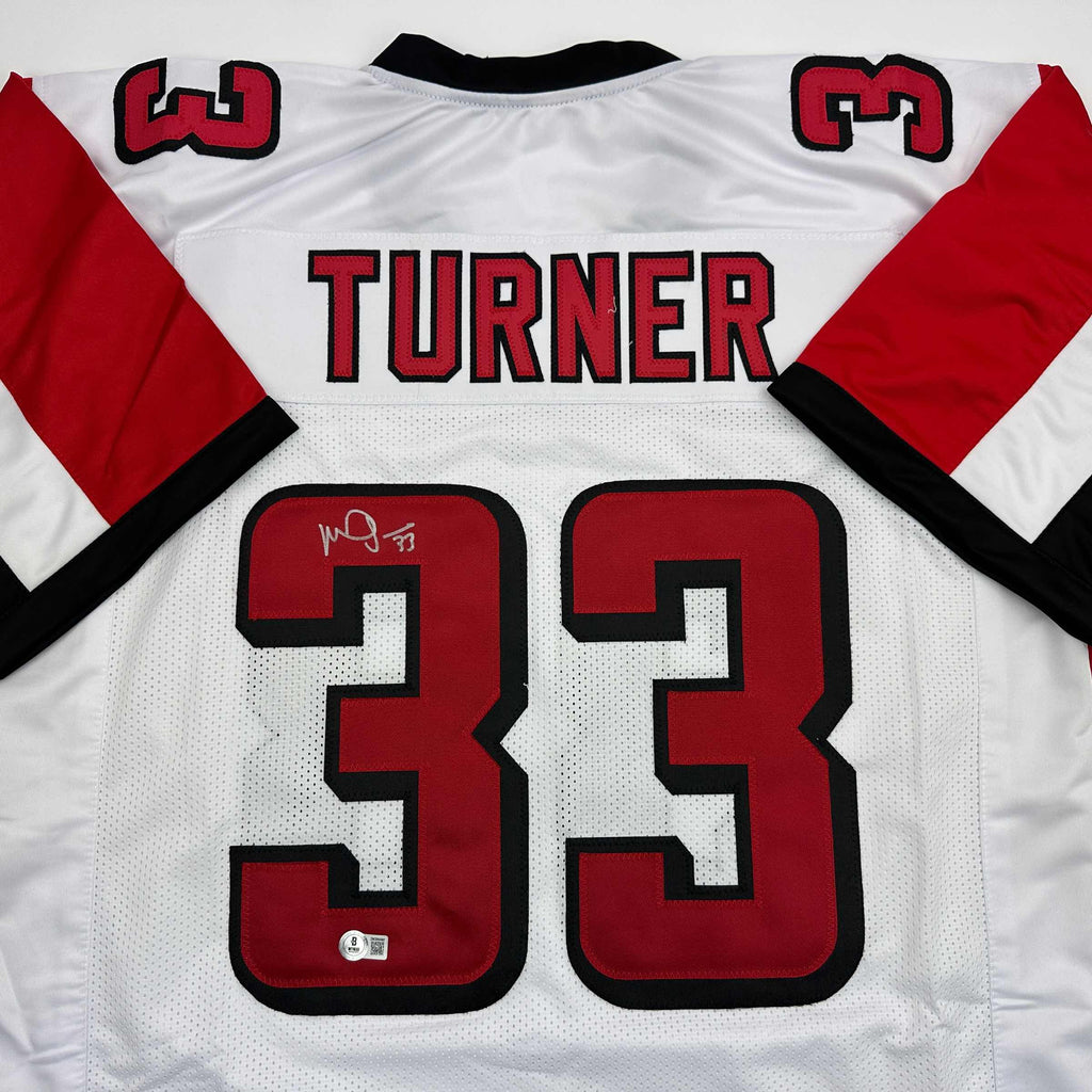 autographed-signed-michael-turner-atlanta-white-football-jersey-beckett-bas-coa