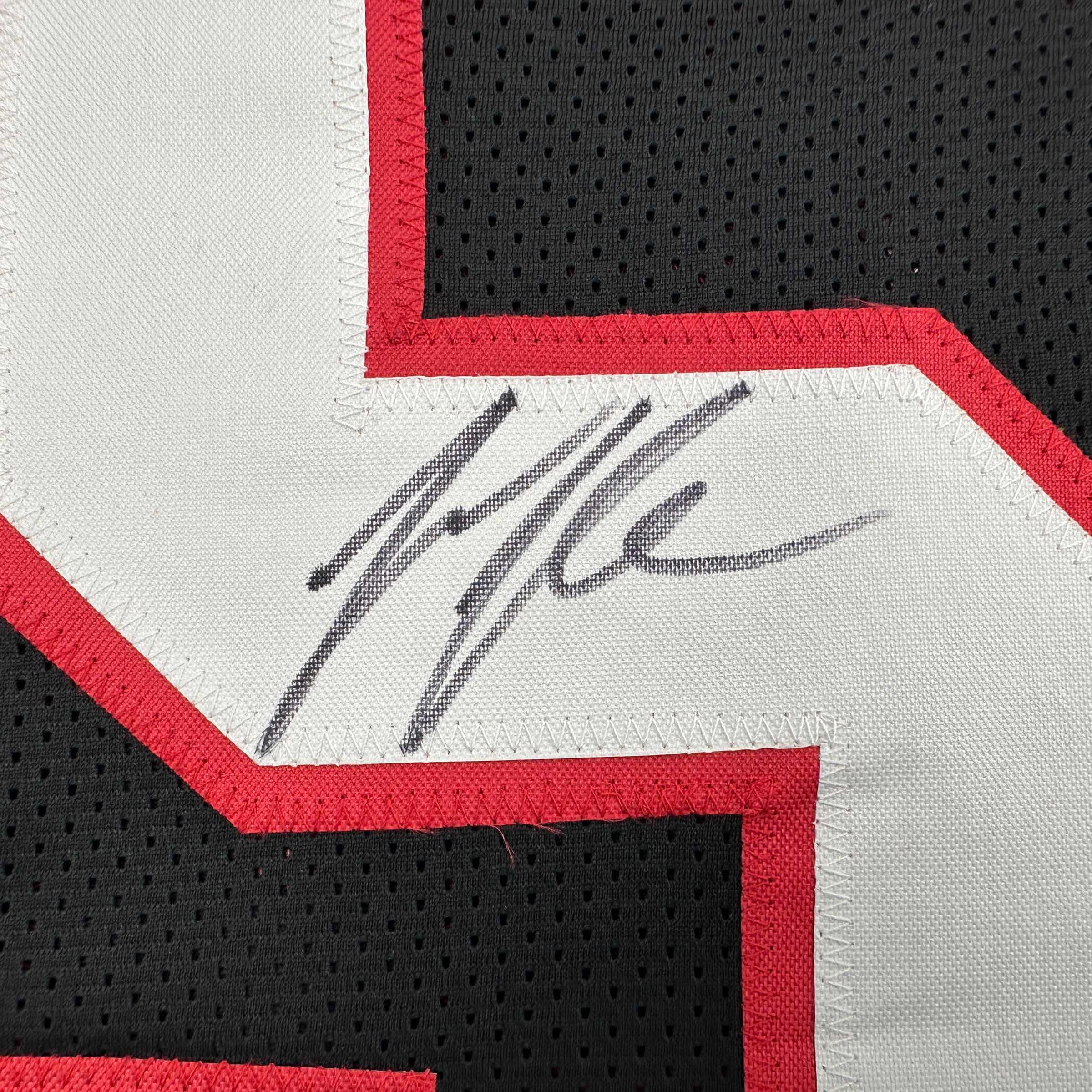 autographed-signed-jessie-tuggle-atlanta-black-football-jersey-jsa-coa