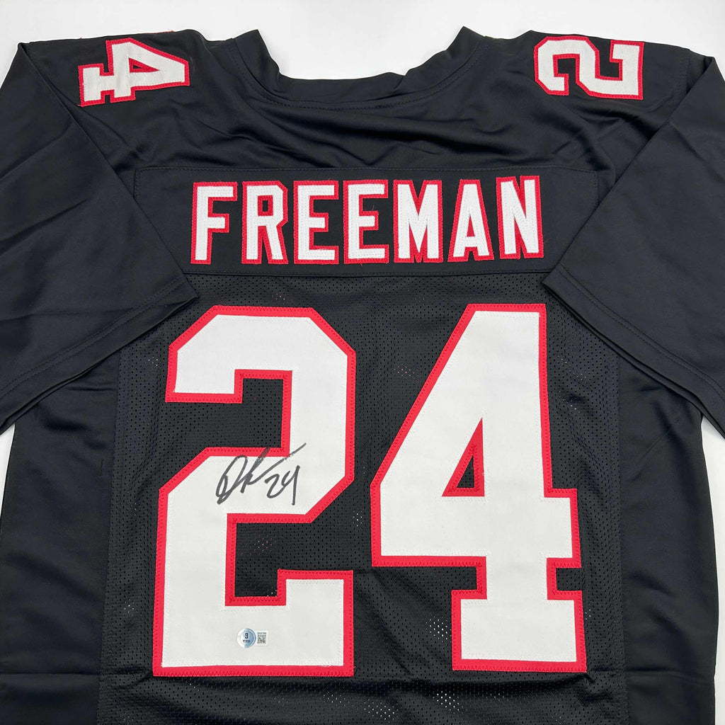 autographed-signed-devonta-freeman-atlanta-retro-black-football-jersey-beckett-bas-coa