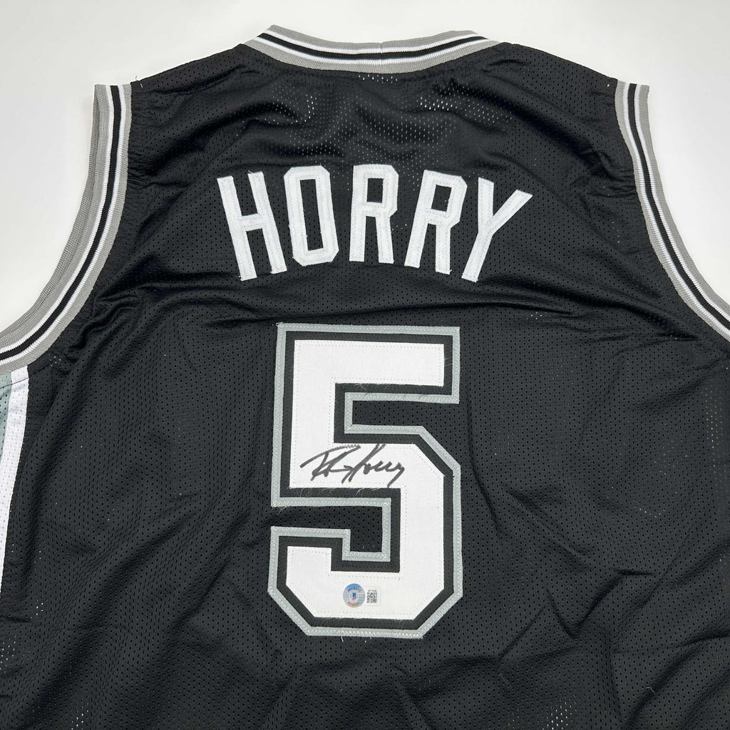autographed-signed-robert-horry-san-antonio-black-basketball-jersey-beckett-bas-coa