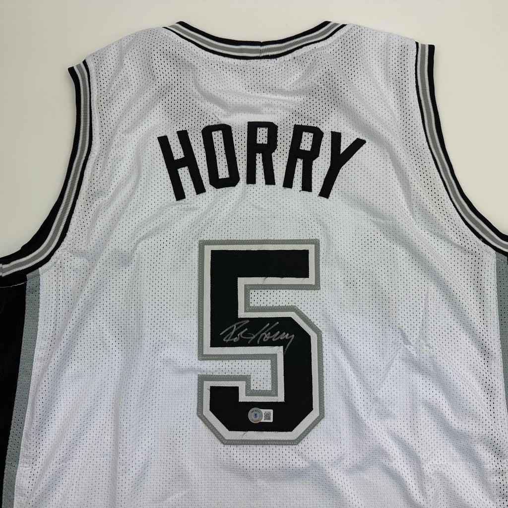autographed-signed-robert-horry-san-antonio-white-basketball-jersey-beckett-bas-coa