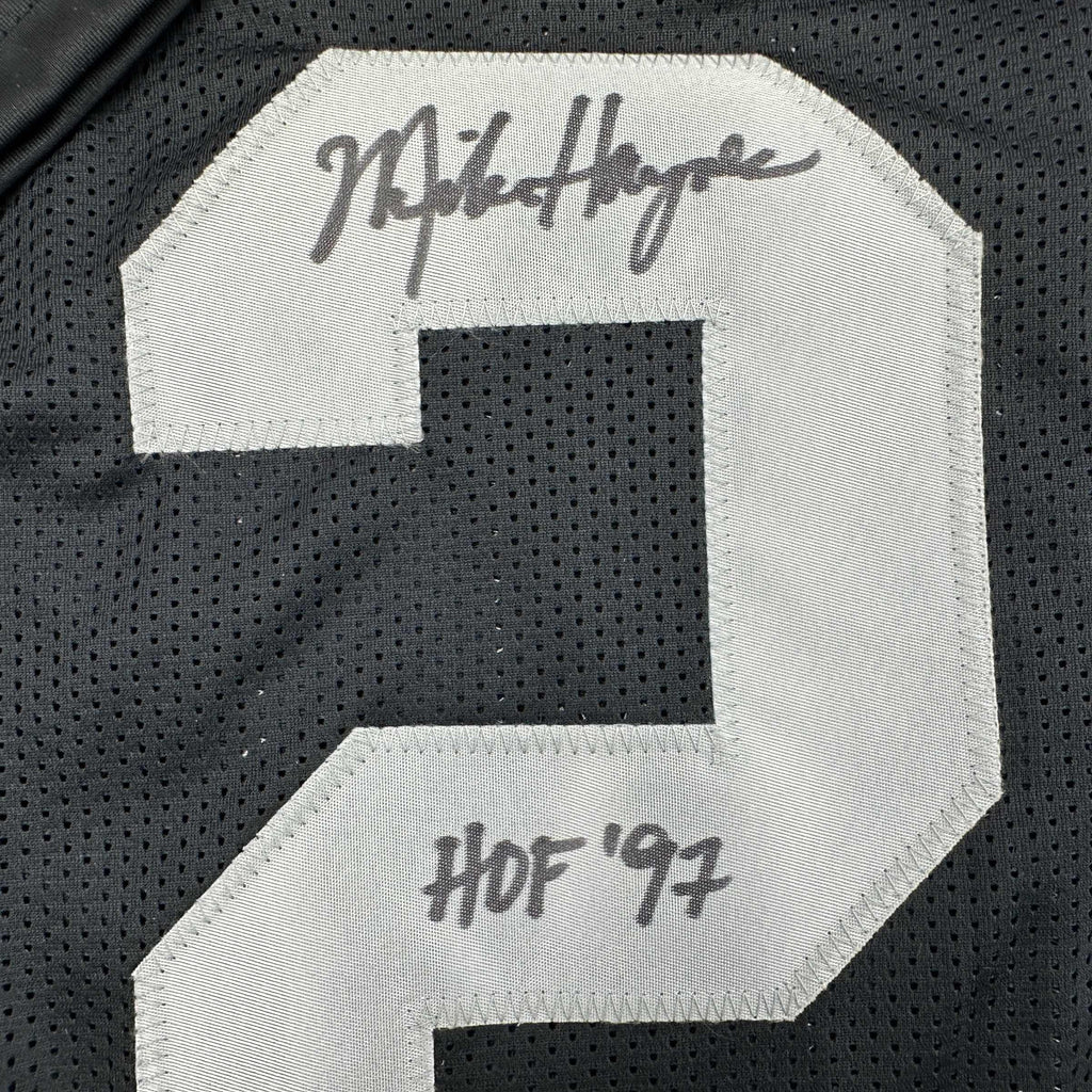 autographed-signed-michael-mike-haynes-hof-97-oakland-black-football-jersey-beckett-bas-coa