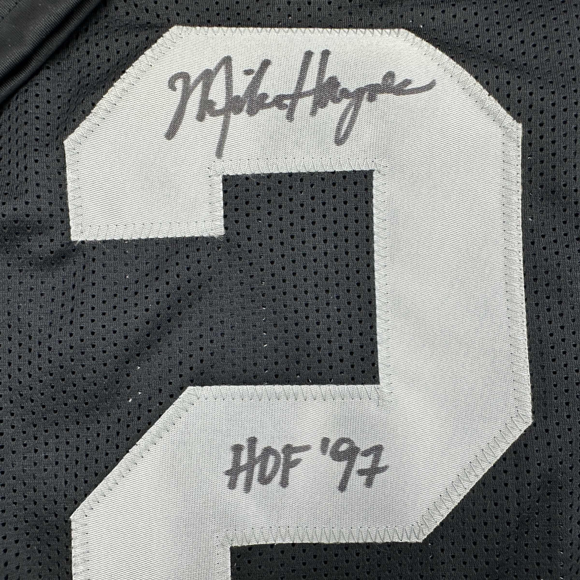autographed-signed-michael-mike-haynes-hof-97-oakland-black-football-jersey-beckett-bas-coa