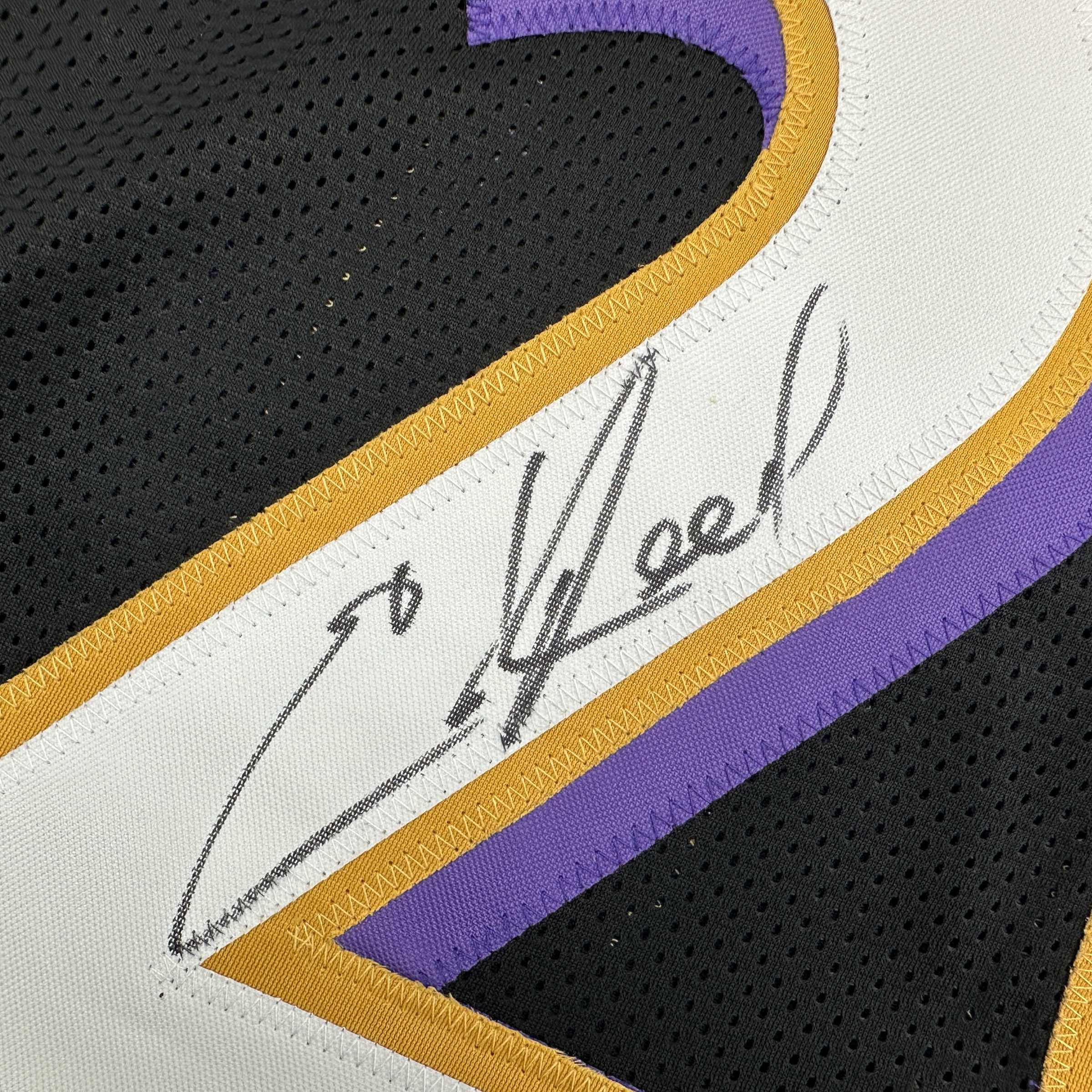 autographed-signed-ed-reed-baltimore-black-football-jersey-beckett-bas-coa