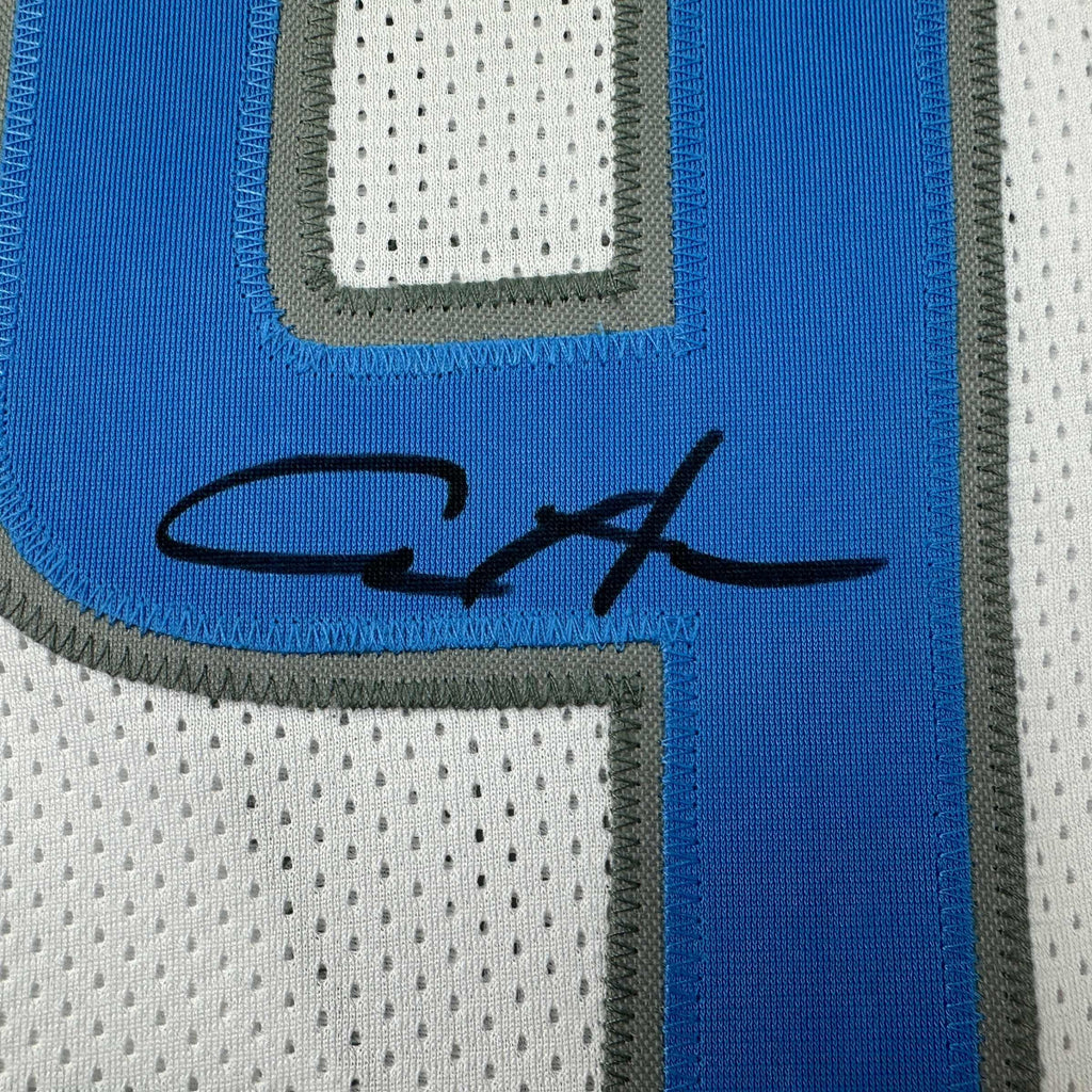 autographed-signed-aidan-hutchinson-detroit-white-football-jersey-beckett-bas-coa