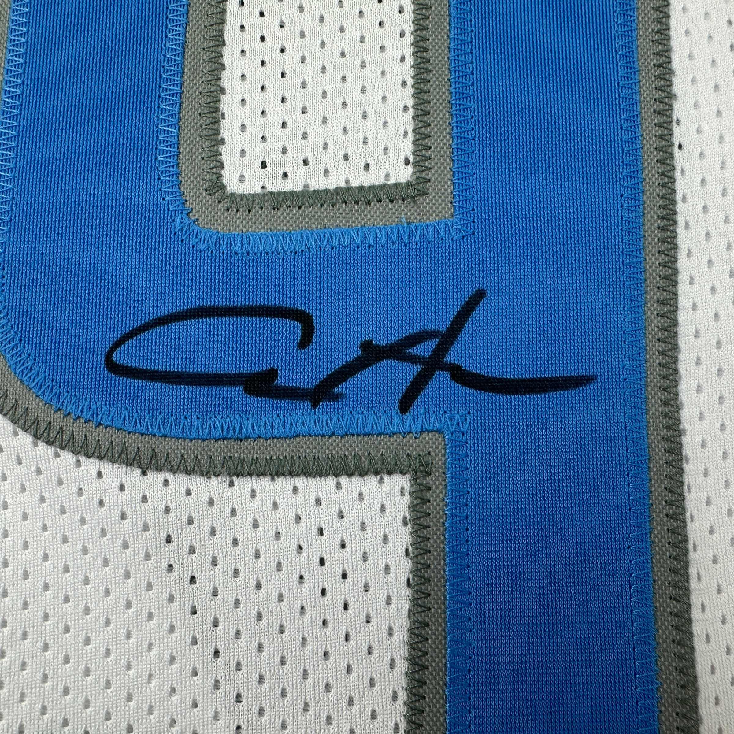 autographed-signed-aidan-hutchinson-detroit-white-football-jersey-beckett-bas-coa