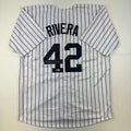 autographed-signed-mariano-rivera-new-york-pinstripe-baseball-jersey-beckett-bas-coa-holo